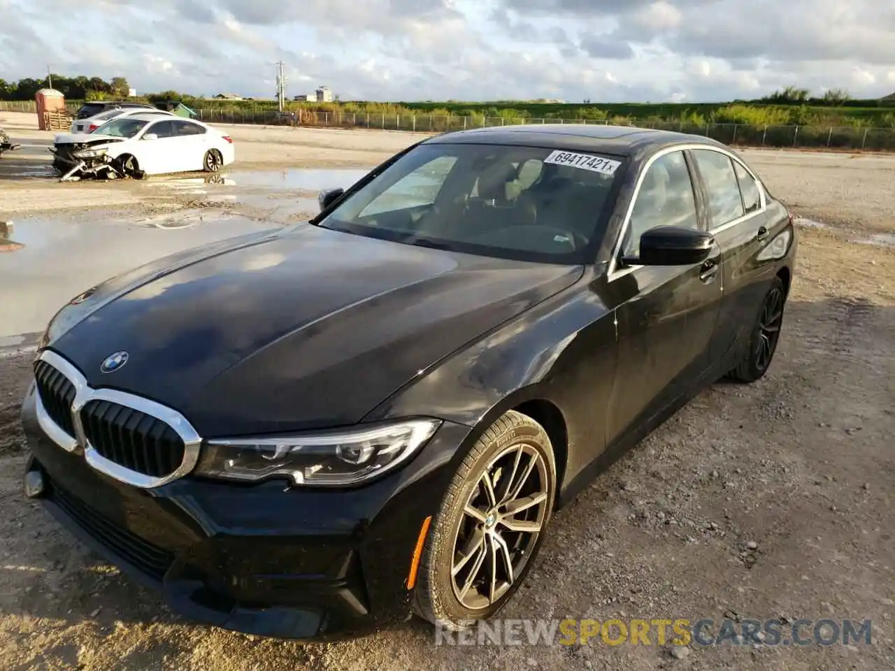 2 Photograph of a damaged car WBA5R1C52KAJ98390 BMW 3 SERIES 2019