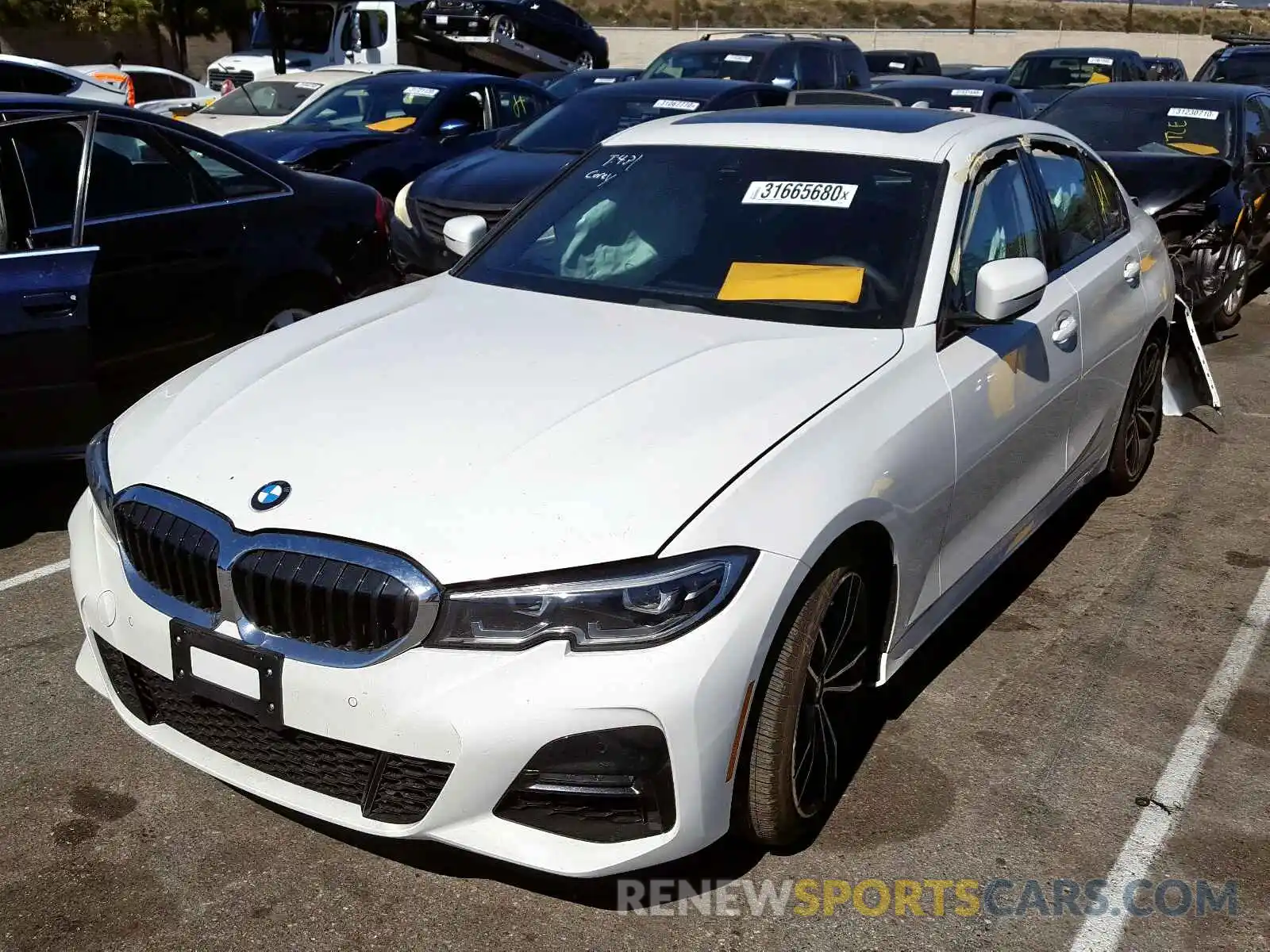 2 Photograph of a damaged car WBA5R1C52KAK12322 BMW 3 SERIES 2019