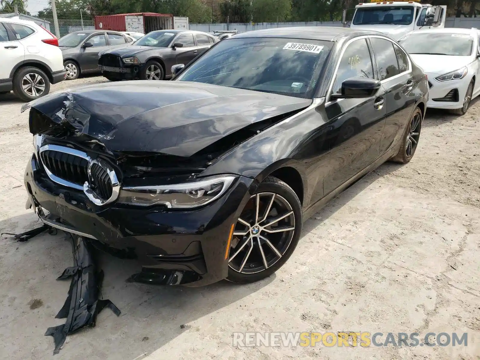 2 Photograph of a damaged car WBA5R1C53KAJ98396 BMW 3 SERIES 2019