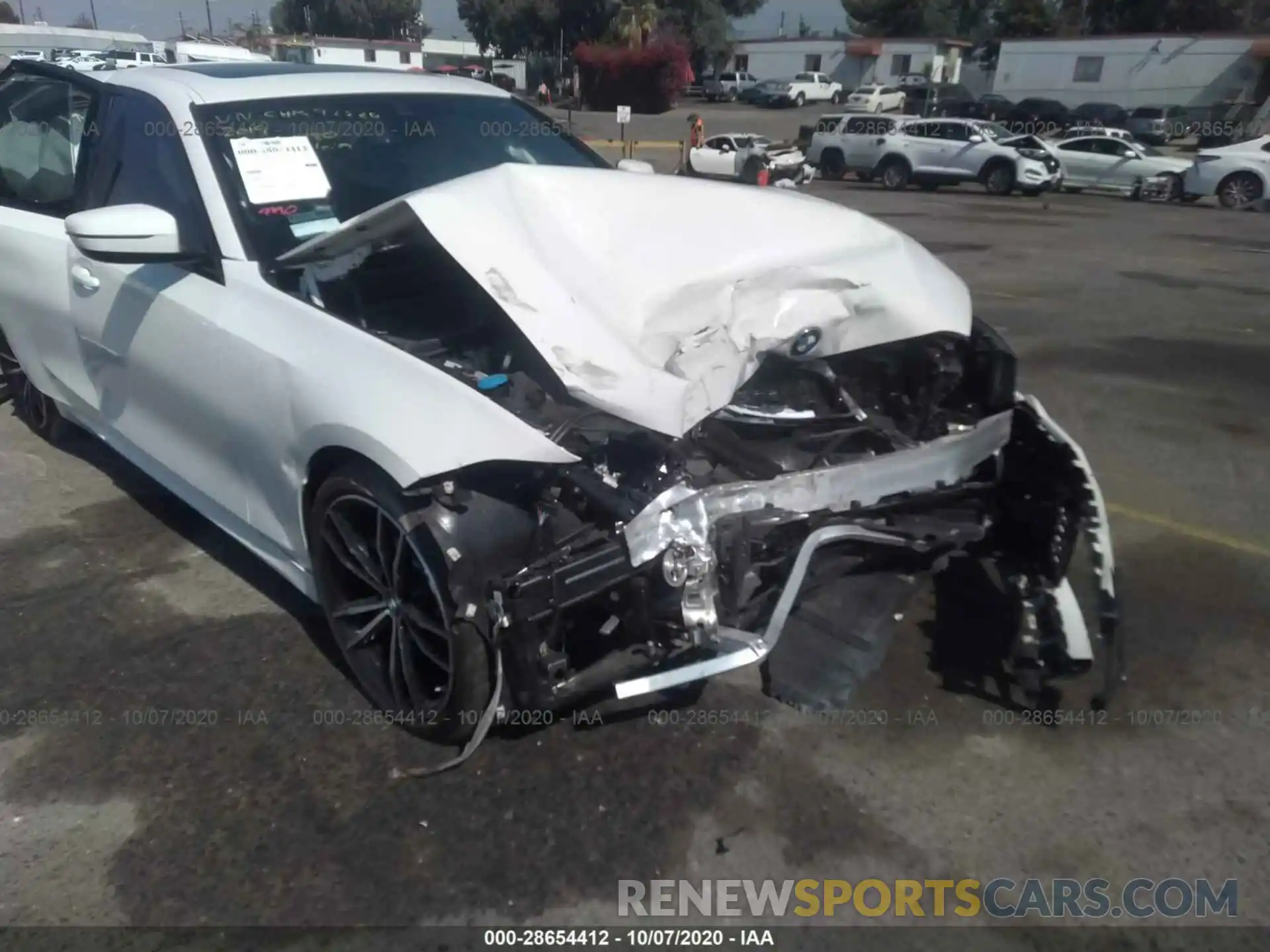 6 Photograph of a damaged car WBA5R1C53KAK11180 BMW 3 SERIES 2019