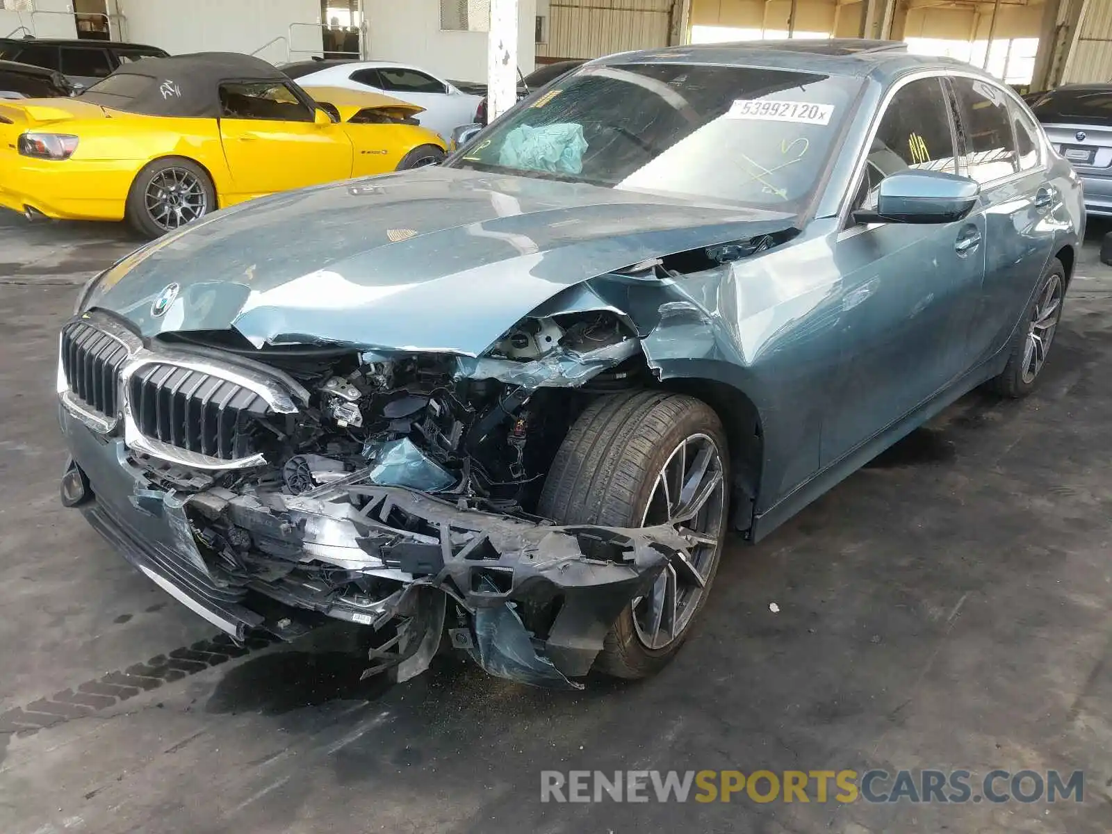 2 Photograph of a damaged car WBA5R1C53KAK12085 BMW 3 SERIES 2019