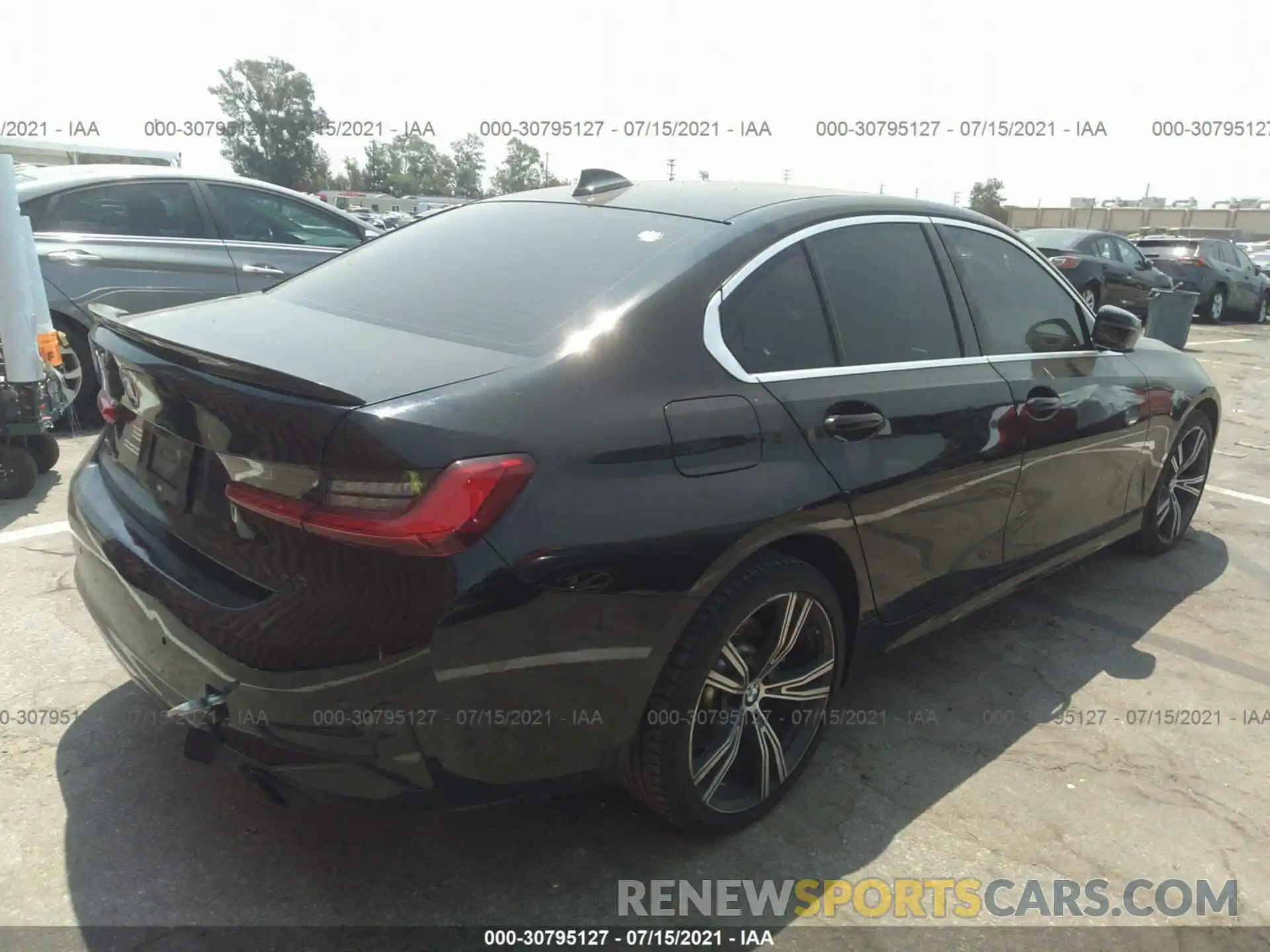 4 Photograph of a damaged car WBA5R1C54KAJ99332 BMW 3 SERIES 2019