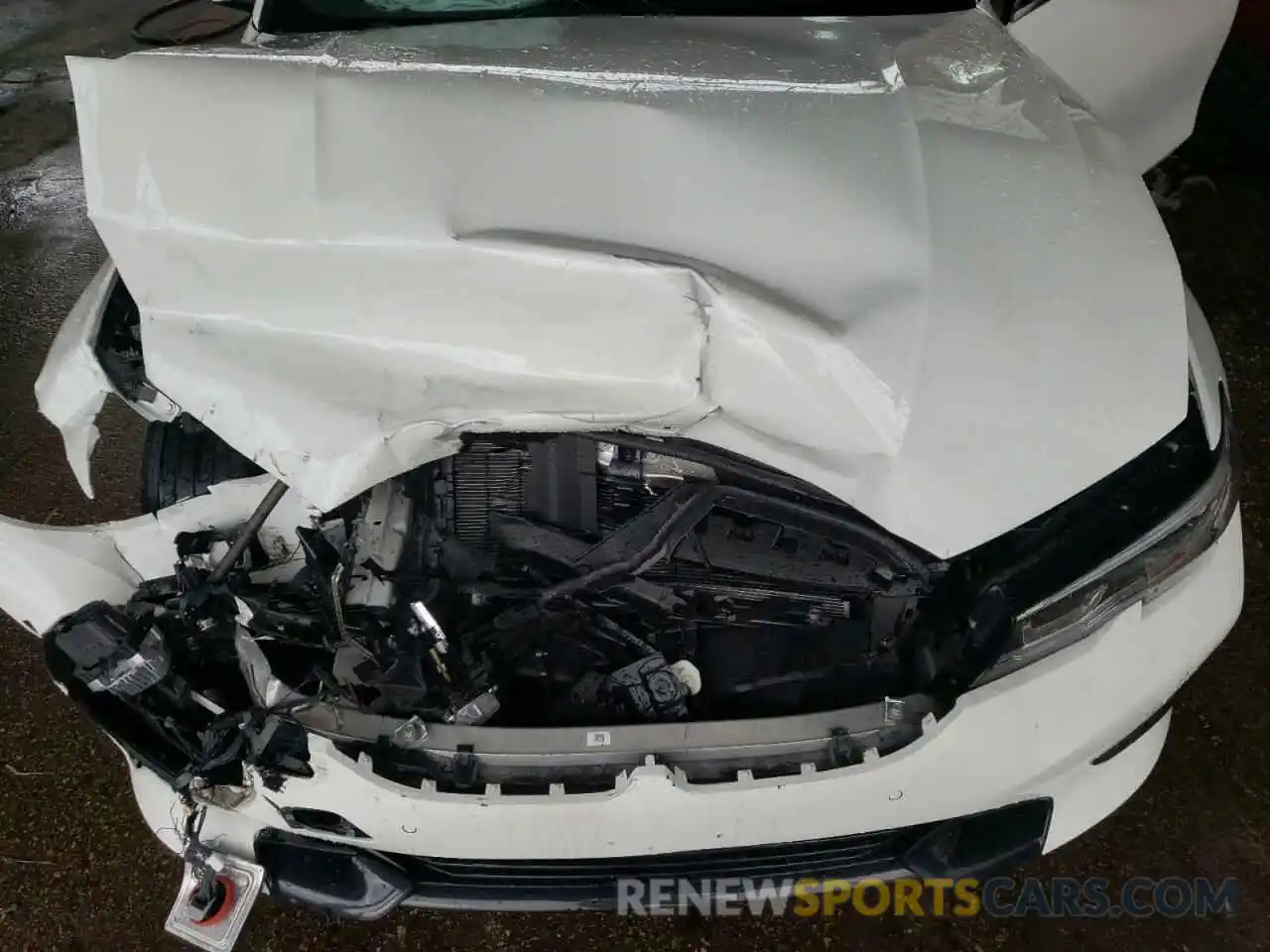 7 Photograph of a damaged car WBA5R1C56KFH15261 BMW 3 SERIES 2019