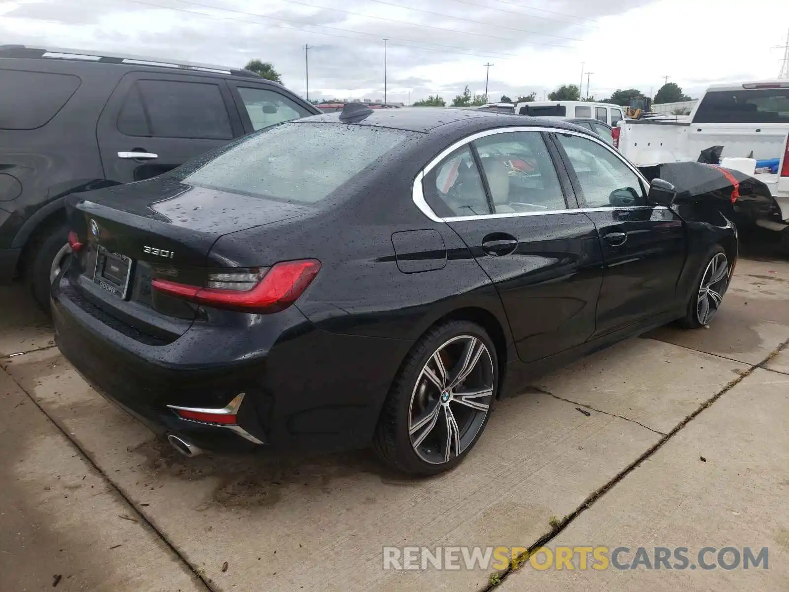 4 Photograph of a damaged car WBA5R1C57KAJ99812 BMW 3 SERIES 2019