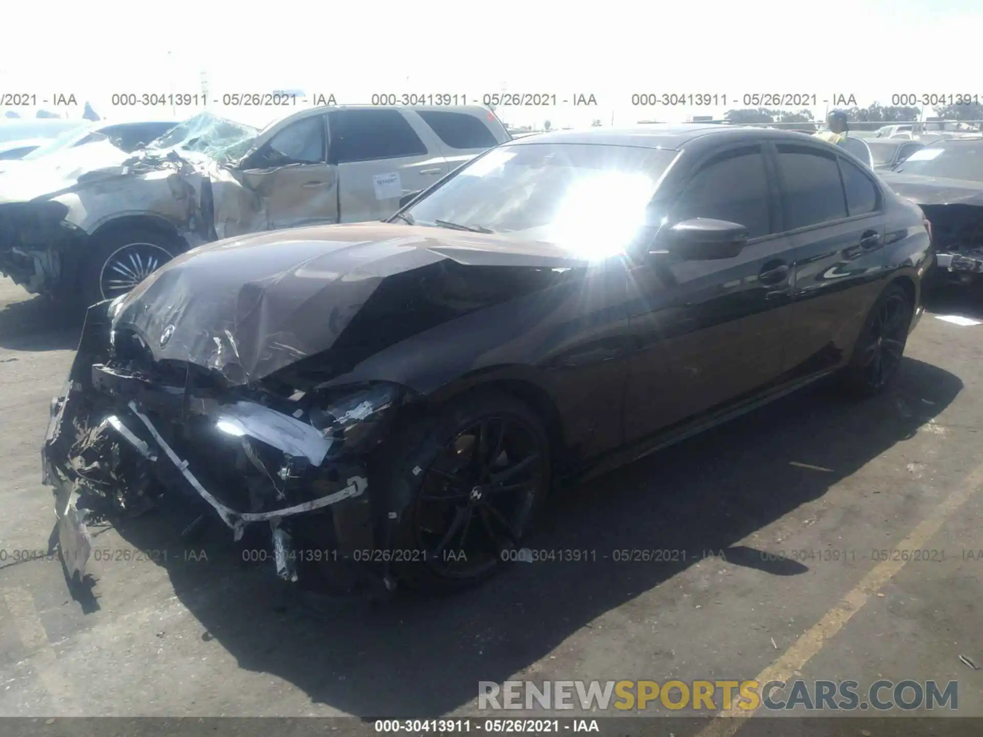 2 Photograph of a damaged car WBA5R1C58KAE81895 BMW 3 SERIES 2019