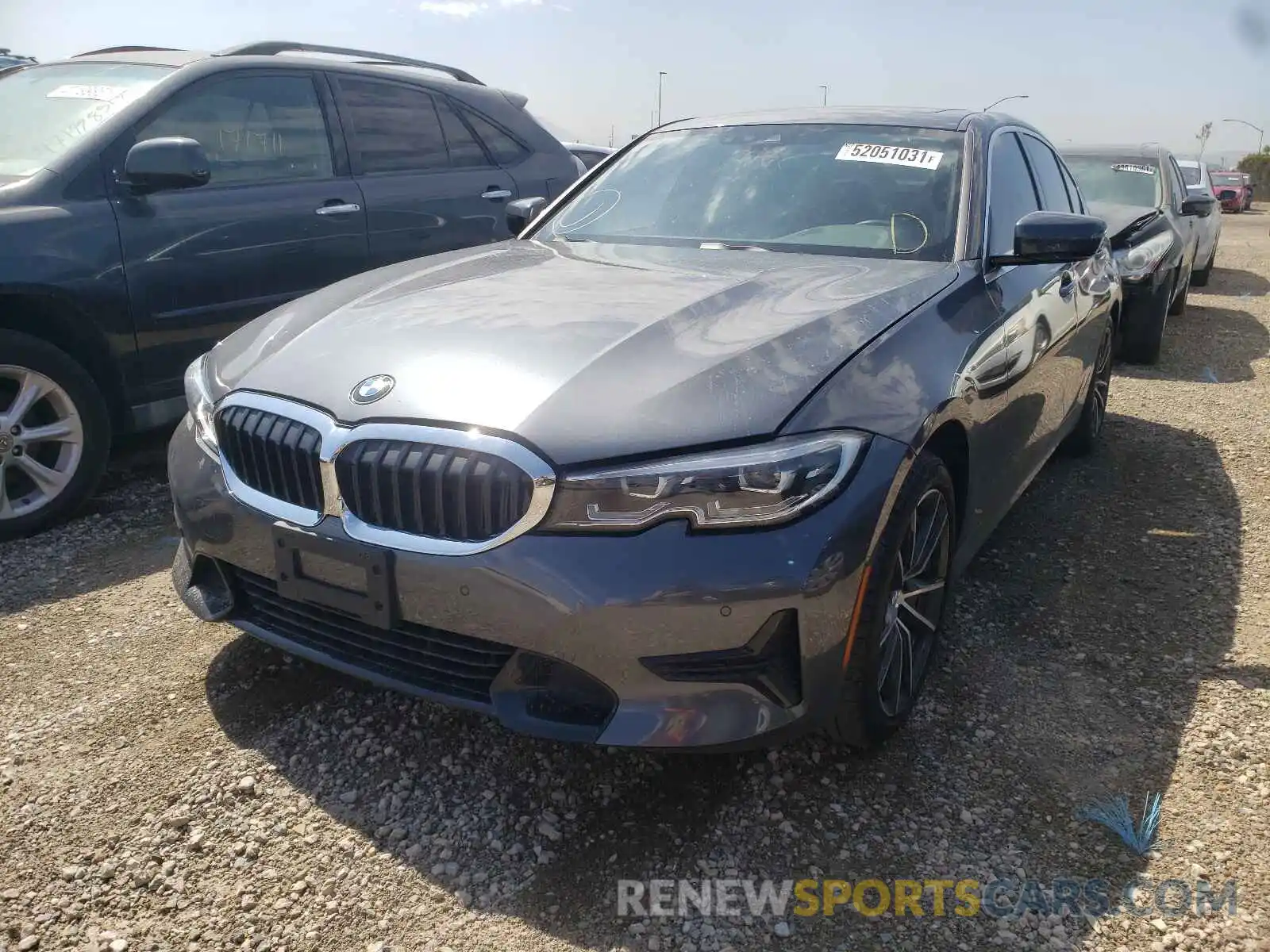 2 Photograph of a damaged car WBA5R1C5XKAK06459 BMW 3 SERIES 2019