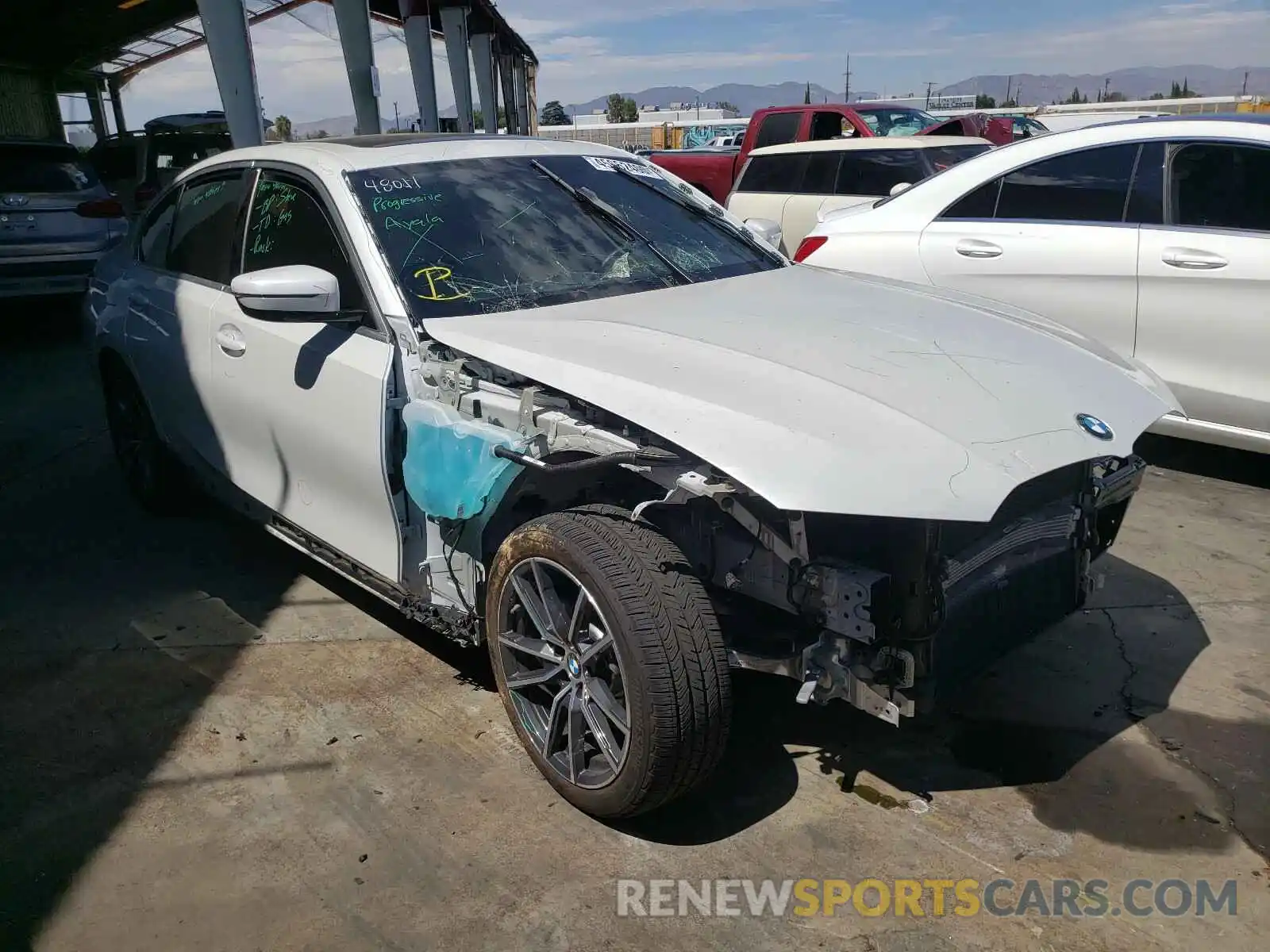 1 Photograph of a damaged car WBA5R1C5XKAK08812 BMW 3 SERIES 2019