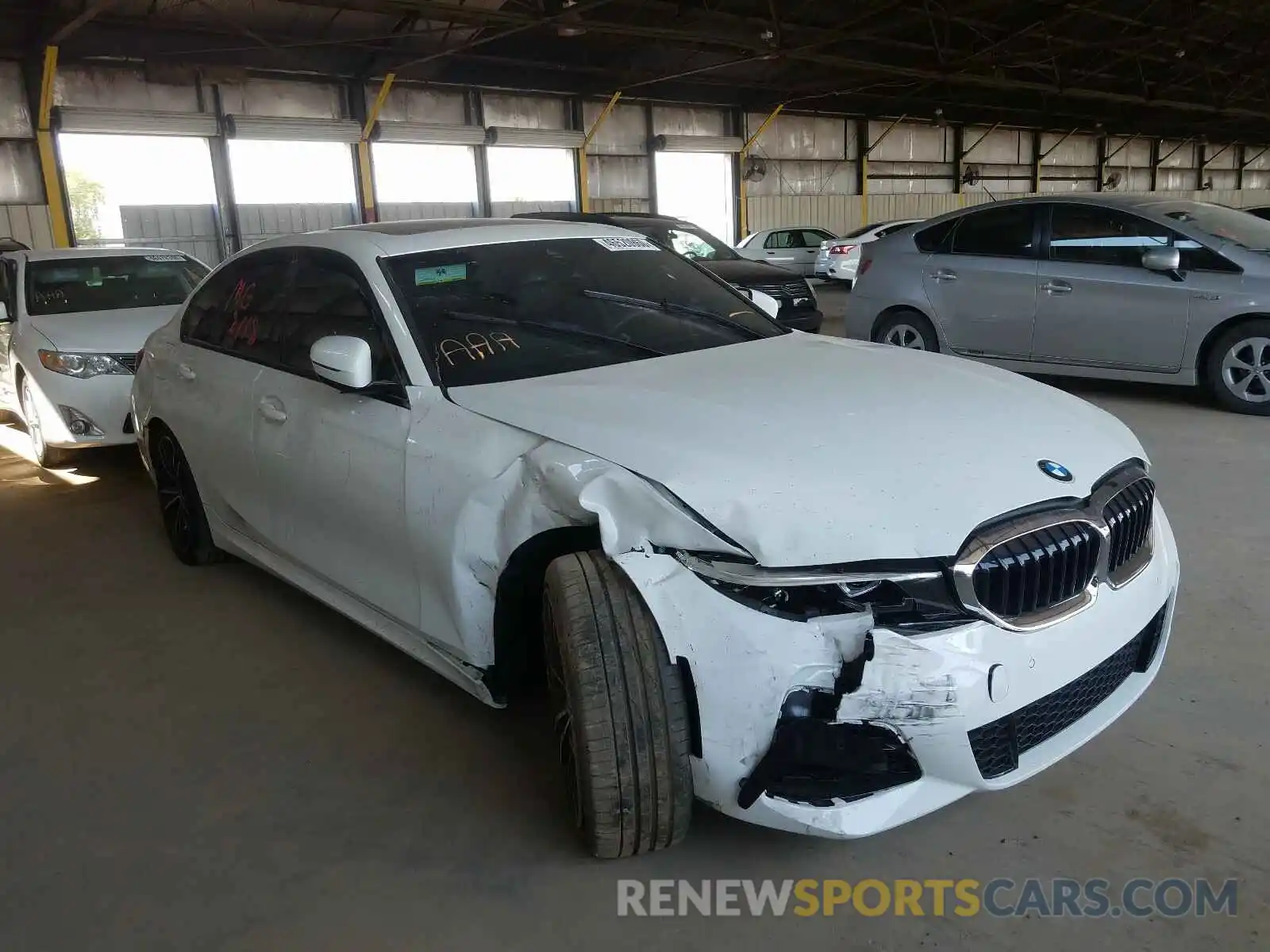 1 Photograph of a damaged car WBA5R1C5XKAK11144 BMW 3 SERIES 2019