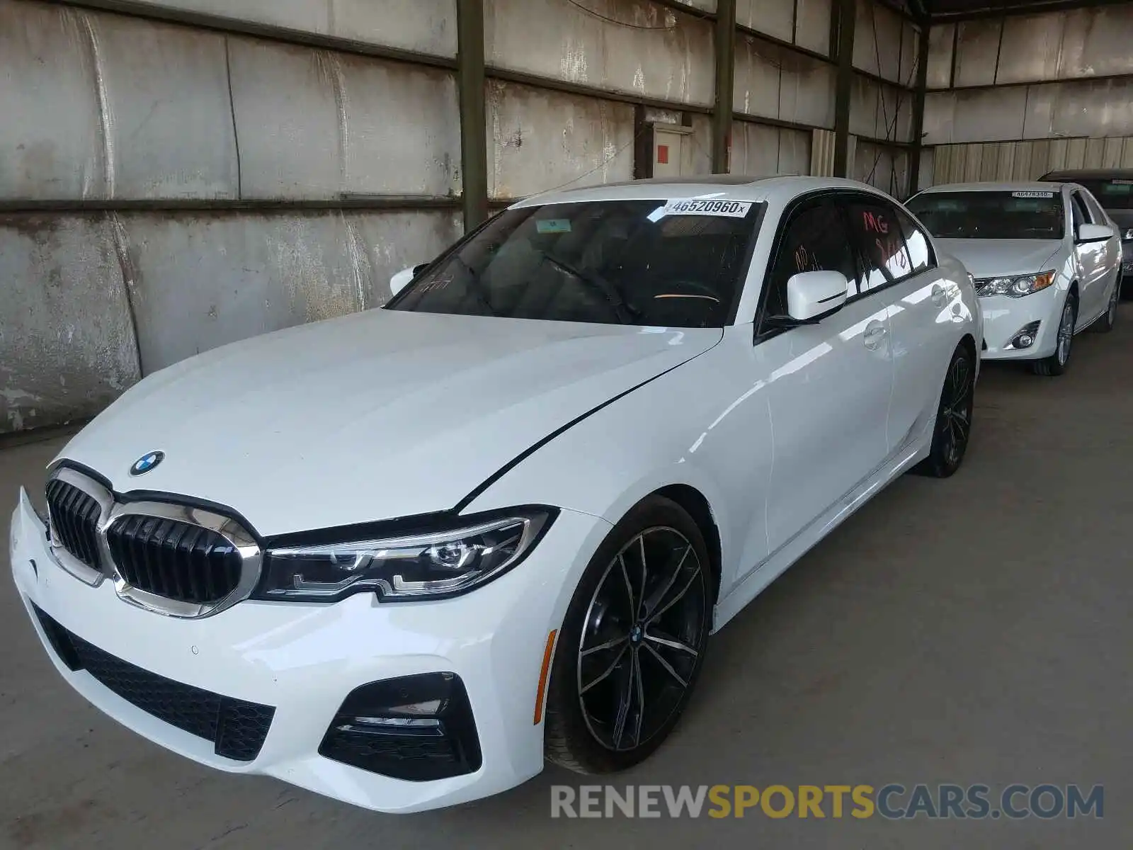 2 Photograph of a damaged car WBA5R1C5XKAK11144 BMW 3 SERIES 2019