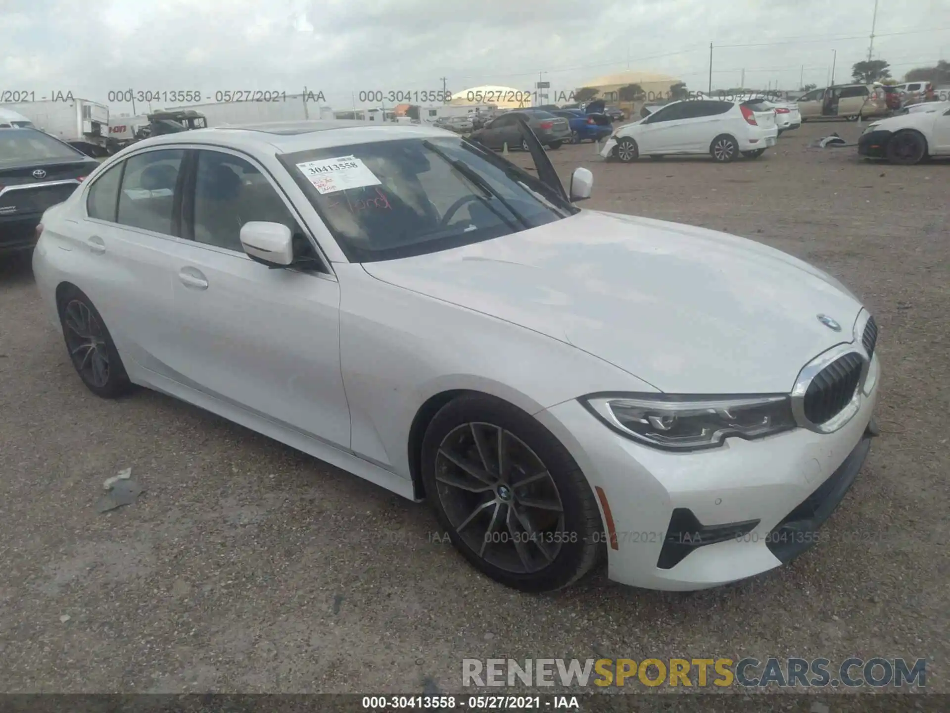 1 Photograph of a damaged car WBA5R1C5XKFH05395 BMW 3 SERIES 2019