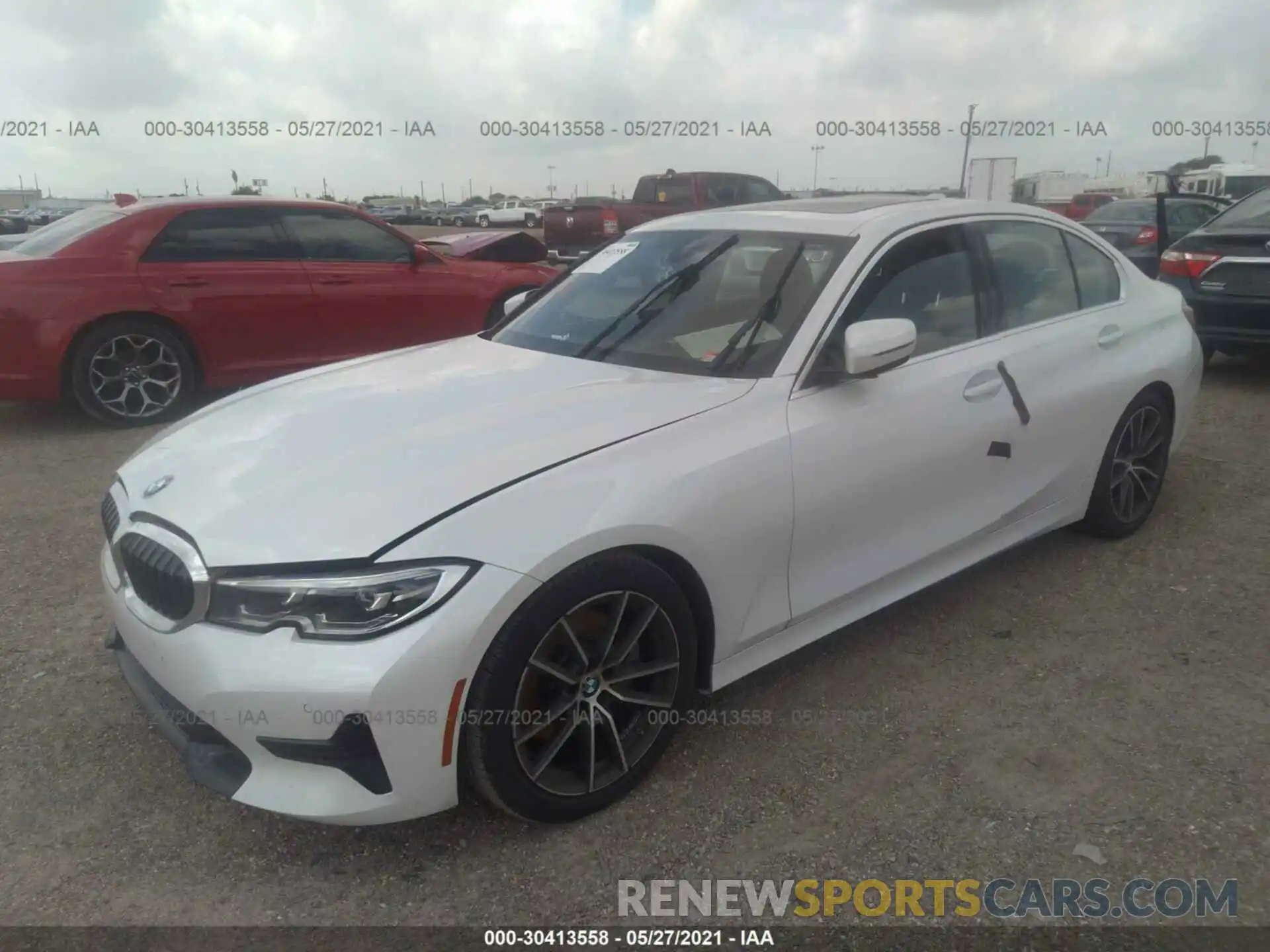 2 Photograph of a damaged car WBA5R1C5XKFH05395 BMW 3 SERIES 2019