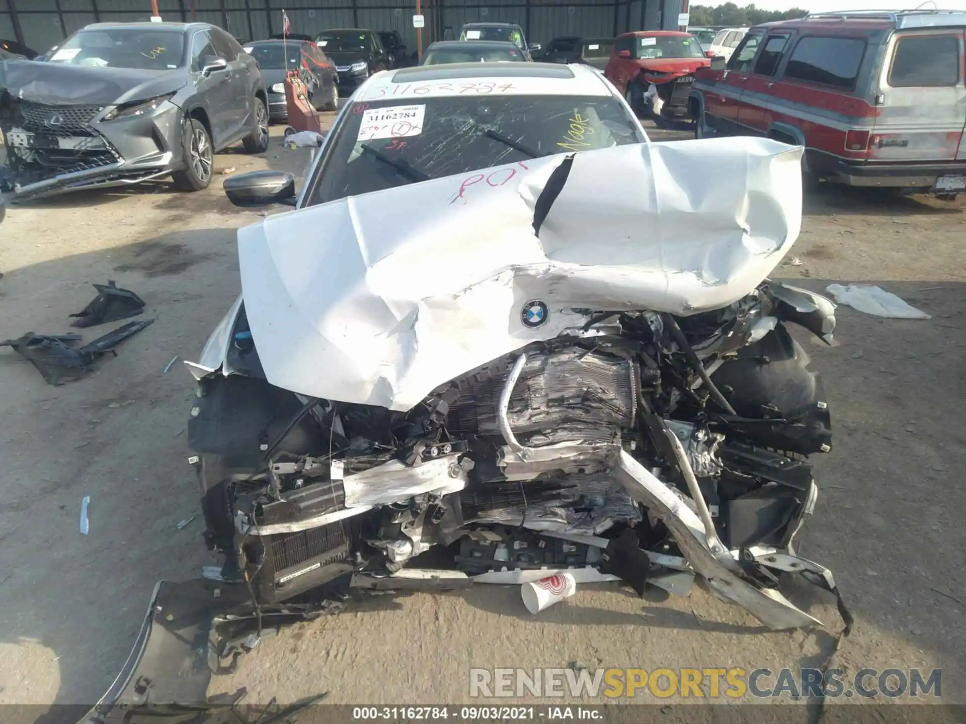 6 Photograph of a damaged car WBA5U7C07LFH07595 BMW 3 SERIES 2020