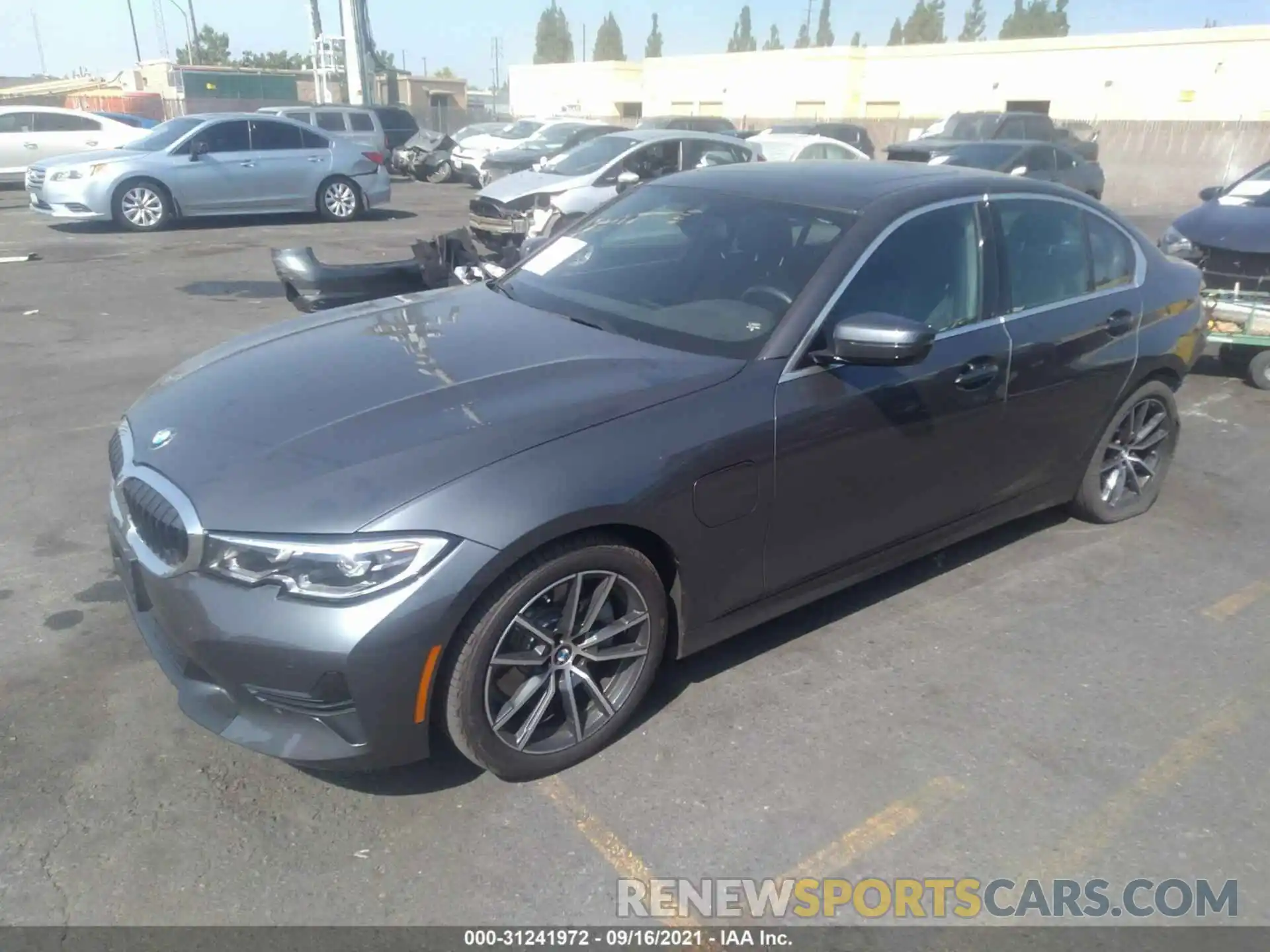 2 Photograph of a damaged car 3MW5P7J07M8C04554 BMW 3 SERIES 2021