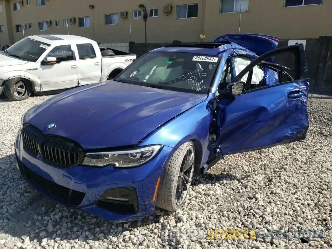 2 Photograph of a damaged car 3MW5R1J06M8C10370 BMW 3 SERIES 2021