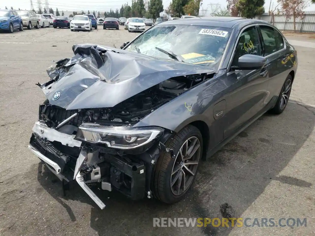 2 Photograph of a damaged car 3MW5P7J00N8C57131 BMW 3 SERIES 2022