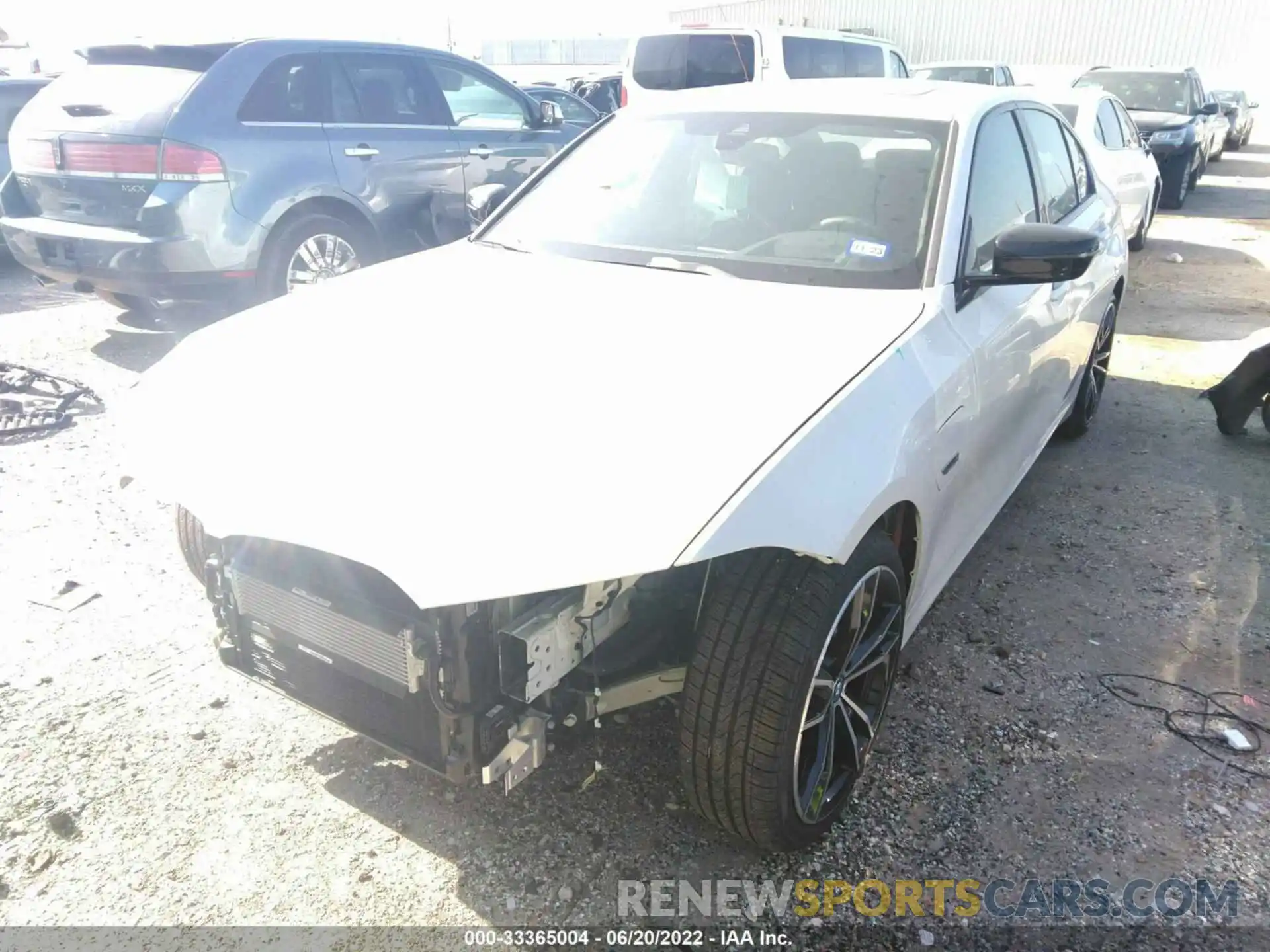 2 Photograph of a damaged car 3MW5P7J07N8C36132 BMW 3 SERIES 2022