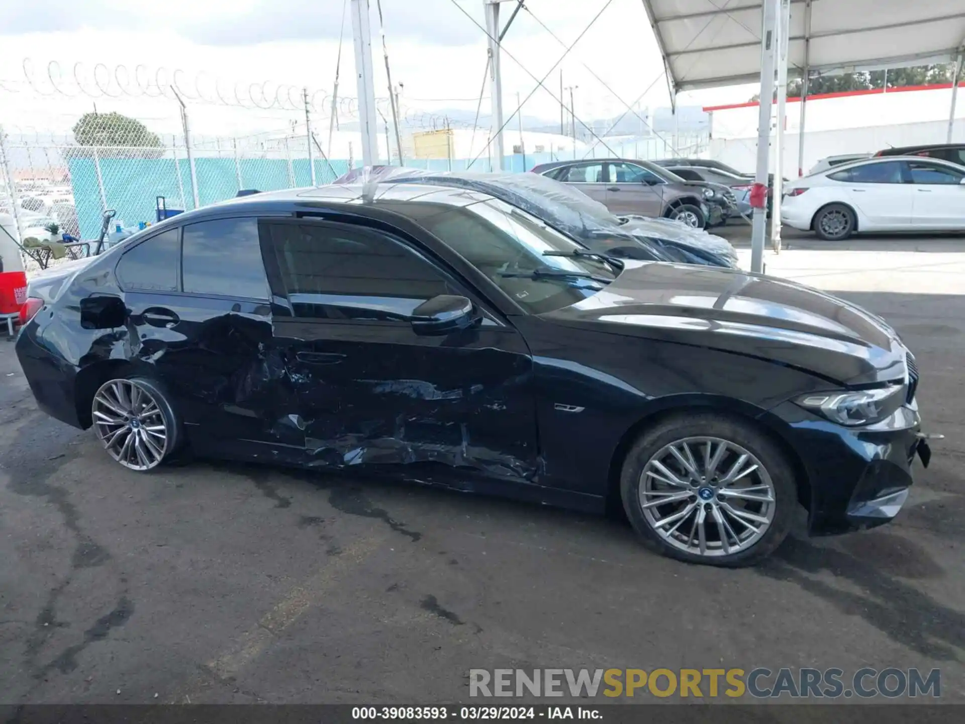 13 Photograph of a damaged car 3MW39FF08P8C79935 BMW 330E 2023