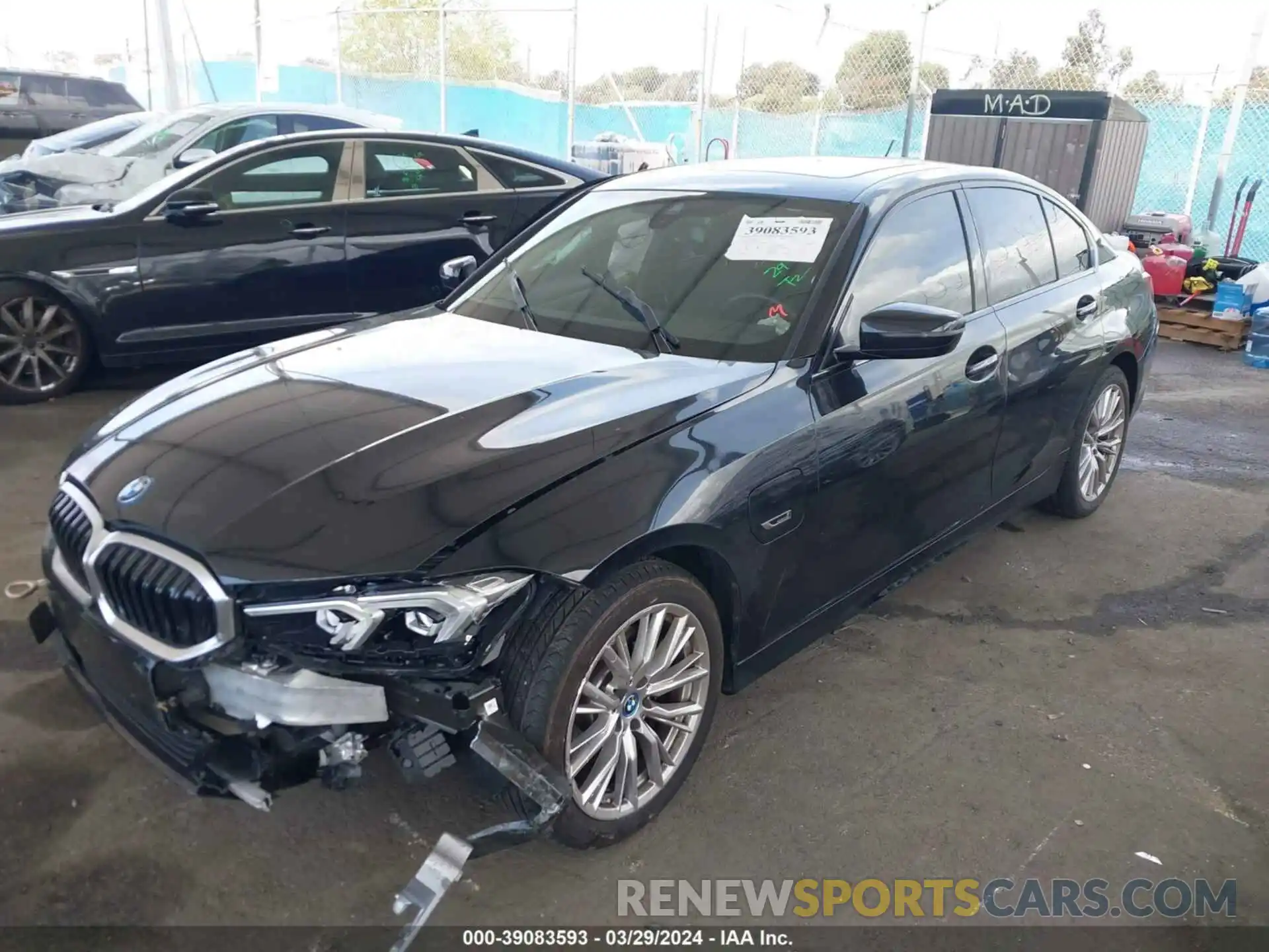 2 Photograph of a damaged car 3MW39FF08P8C79935 BMW 330E 2023