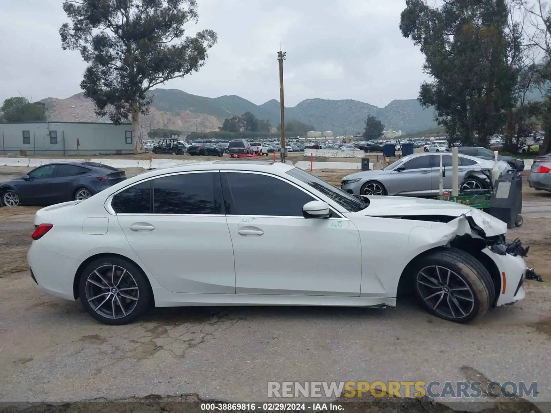 14 Photograph of a damaged car 3MW5R1J53K8A05565 BMW 330I 2019