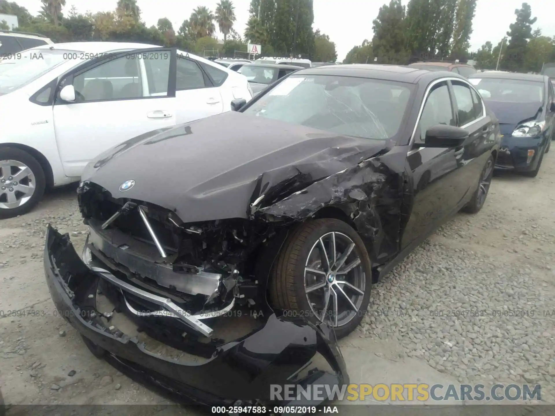 2 Photograph of a damaged car WBA5R1C53KAE82131 BMW 330I 2019