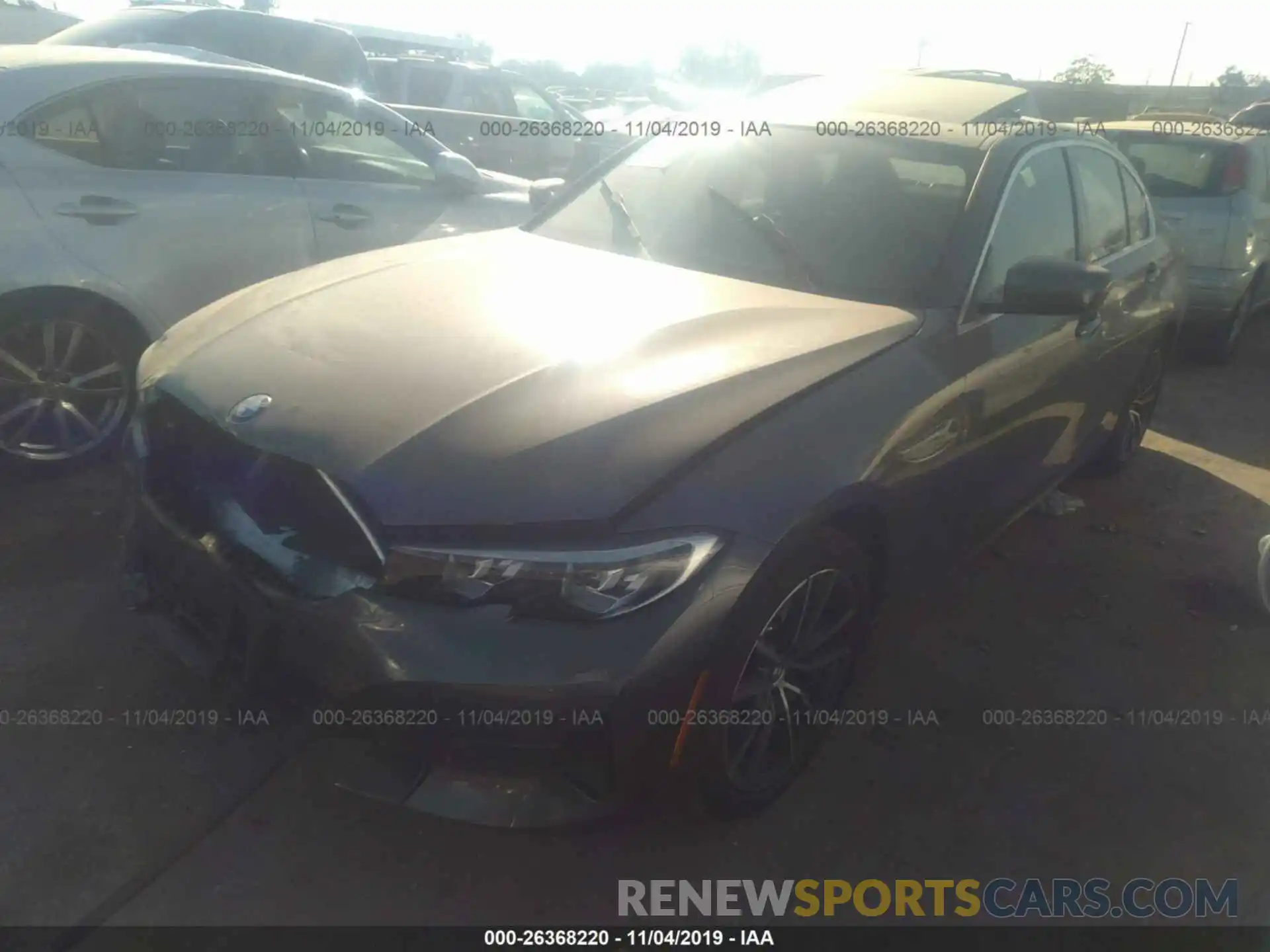 2 Photograph of a damaged car WBA5R1C55KAK12590 BMW 330I 2019