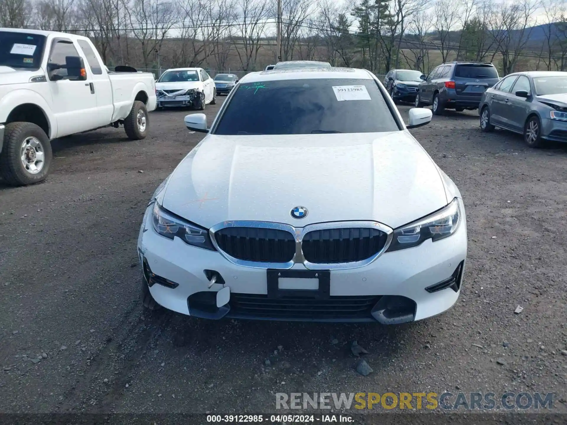 12 Photograph of a damaged car 3MW5R7J09L8B40414 BMW 330I 2020