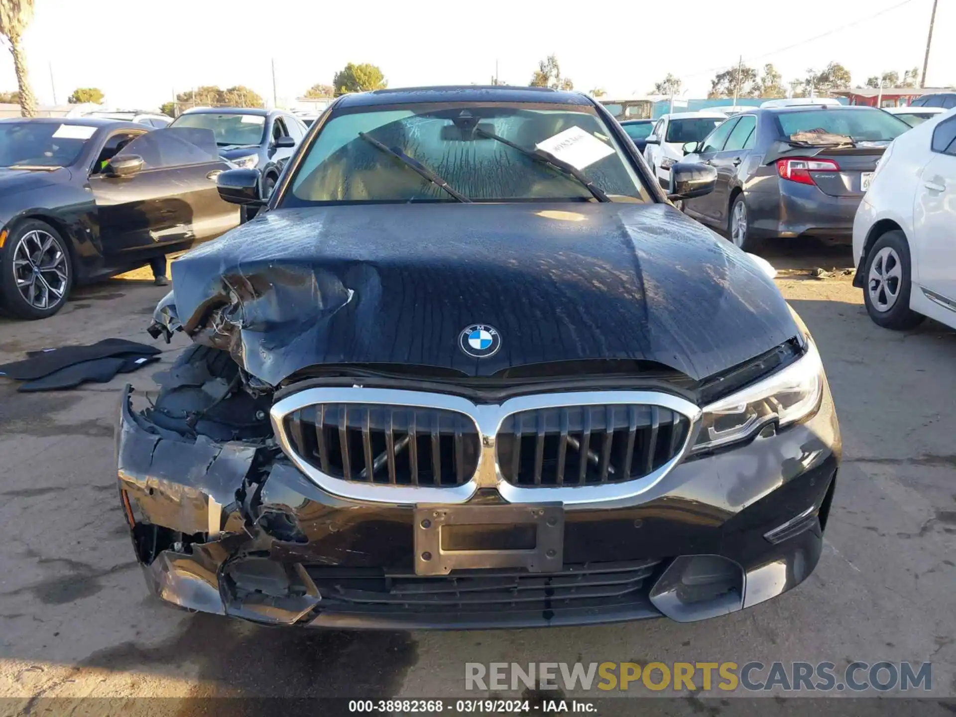 12 Photograph of a damaged car 3MW5R1J01M8B98645 BMW 330I 2021