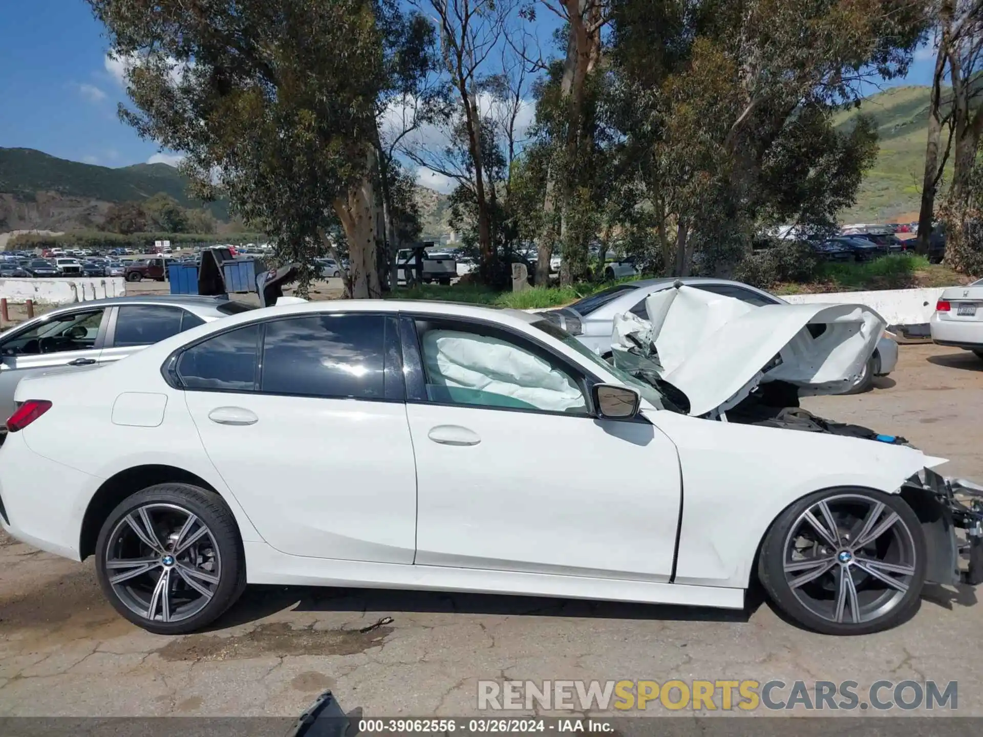 12 Photograph of a damaged car 3MW5R1J02N8C22999 BMW 330I 2022