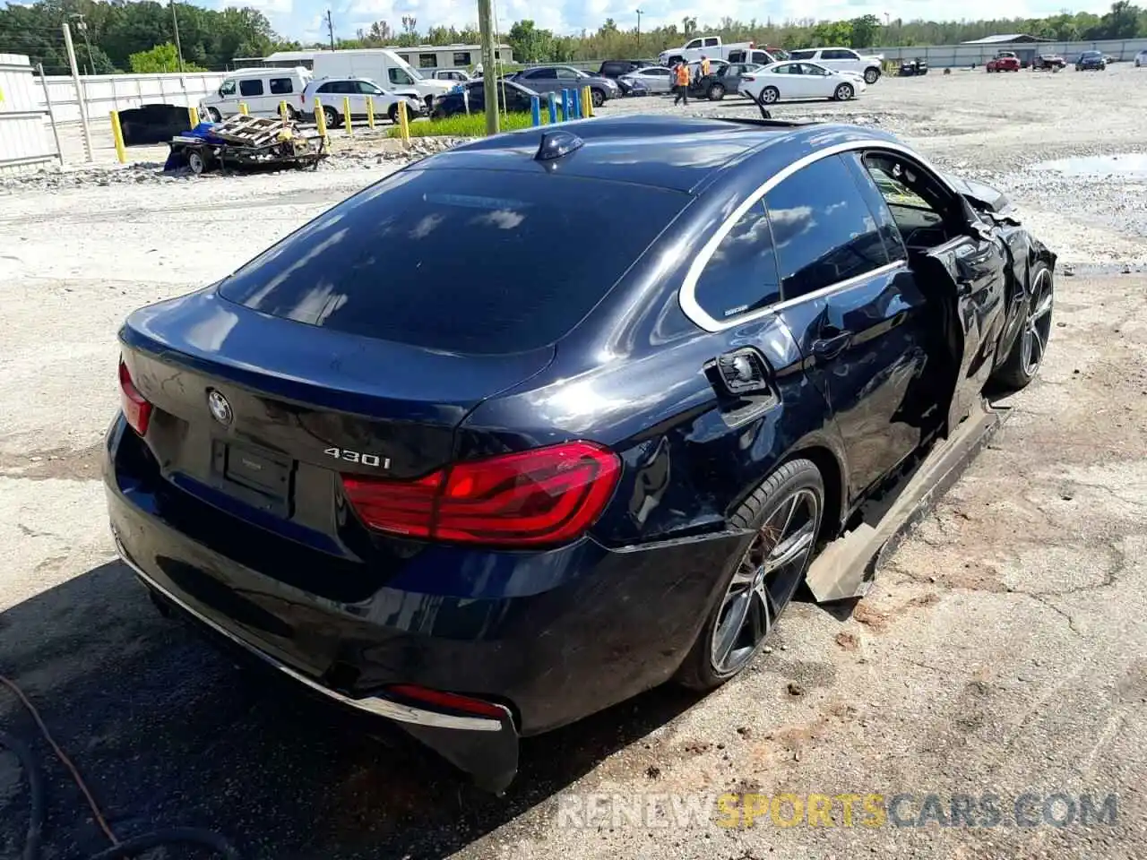 4 Photograph of a damaged car WBA4J1C51KBM11990 BMW 4 SERIES 2019