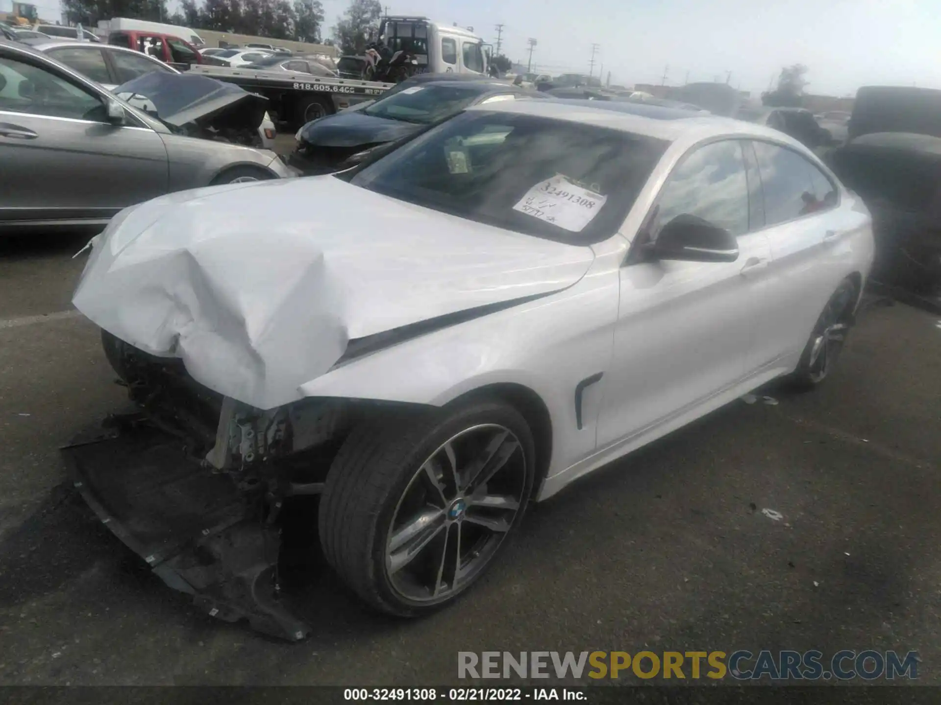 2 Photograph of a damaged car WBA4J1C57KBM12478 BMW 4 SERIES 2019