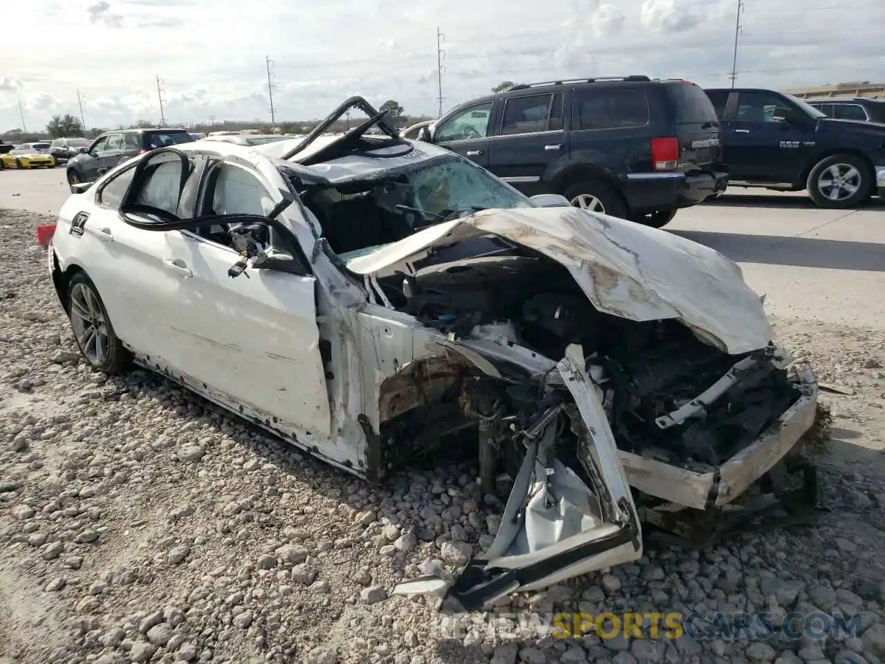 4 Photograph of a damaged car WBA4J1C57KBM13792 BMW 4 SERIES 2019