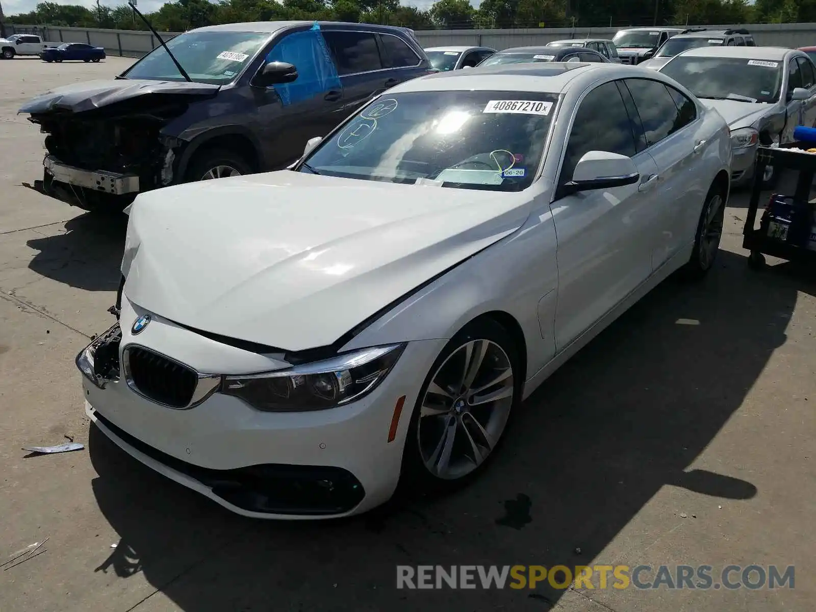 2 Photograph of a damaged car WBA4J1C59KBM16807 BMW 4 SERIES 2019