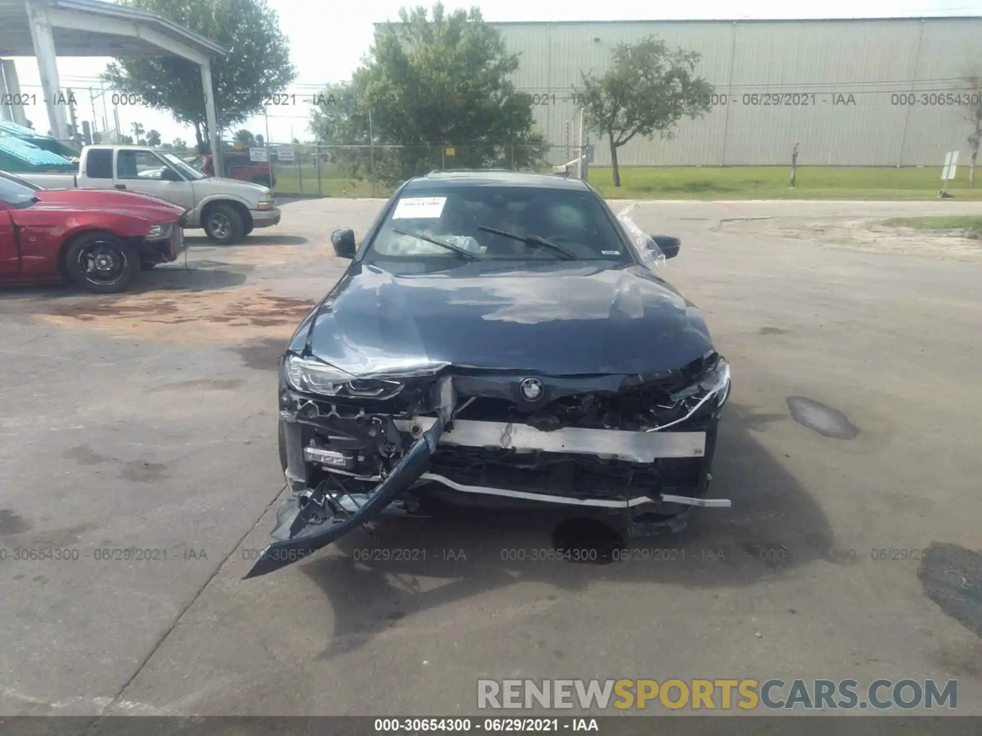 6 Photograph of a damaged car WBA53AP09MCG23291 BMW 4 SERIES 2021