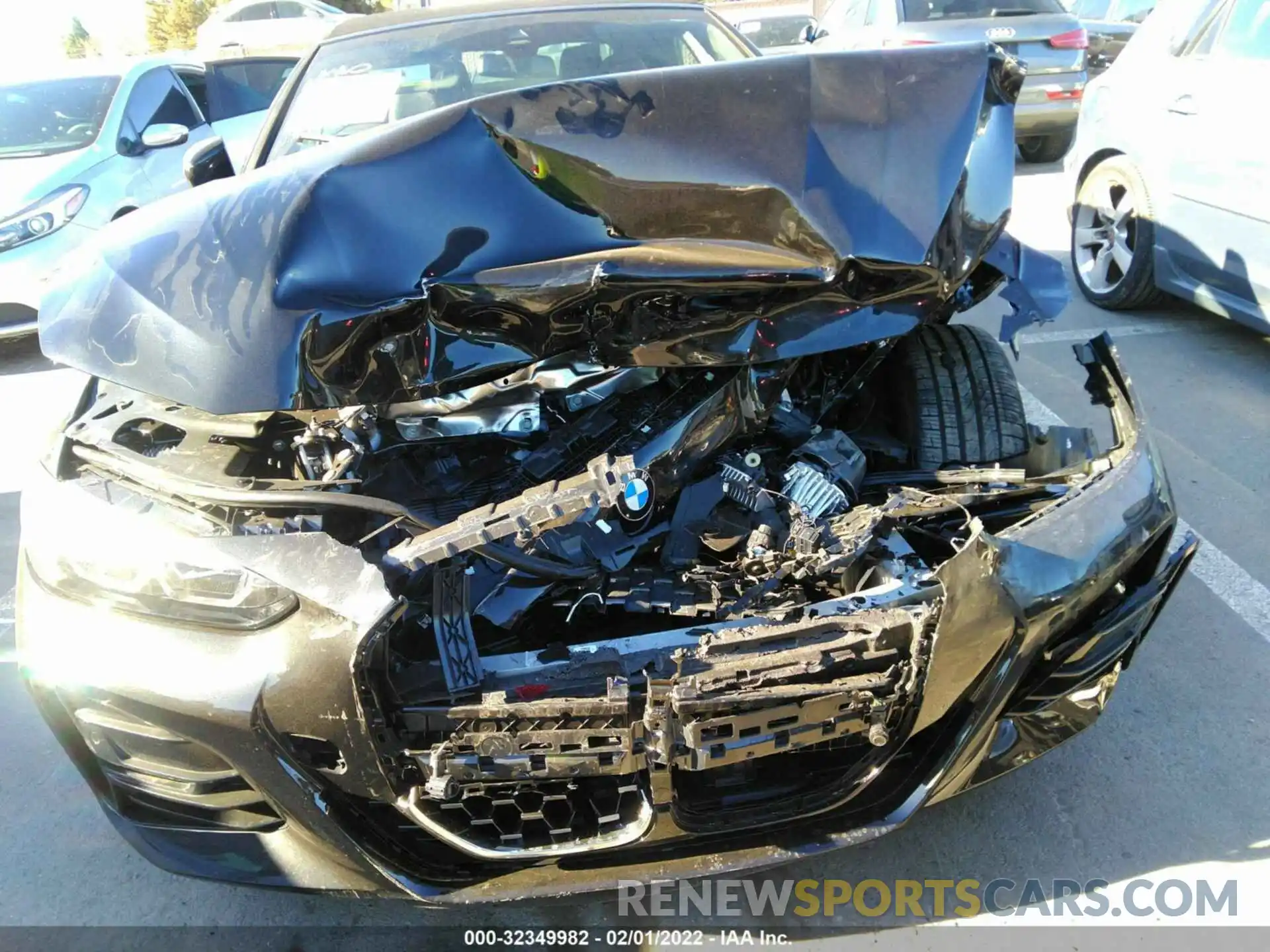 6 Photograph of a damaged car WBA23AT05NCJ54711 BMW 4 SERIES 2022