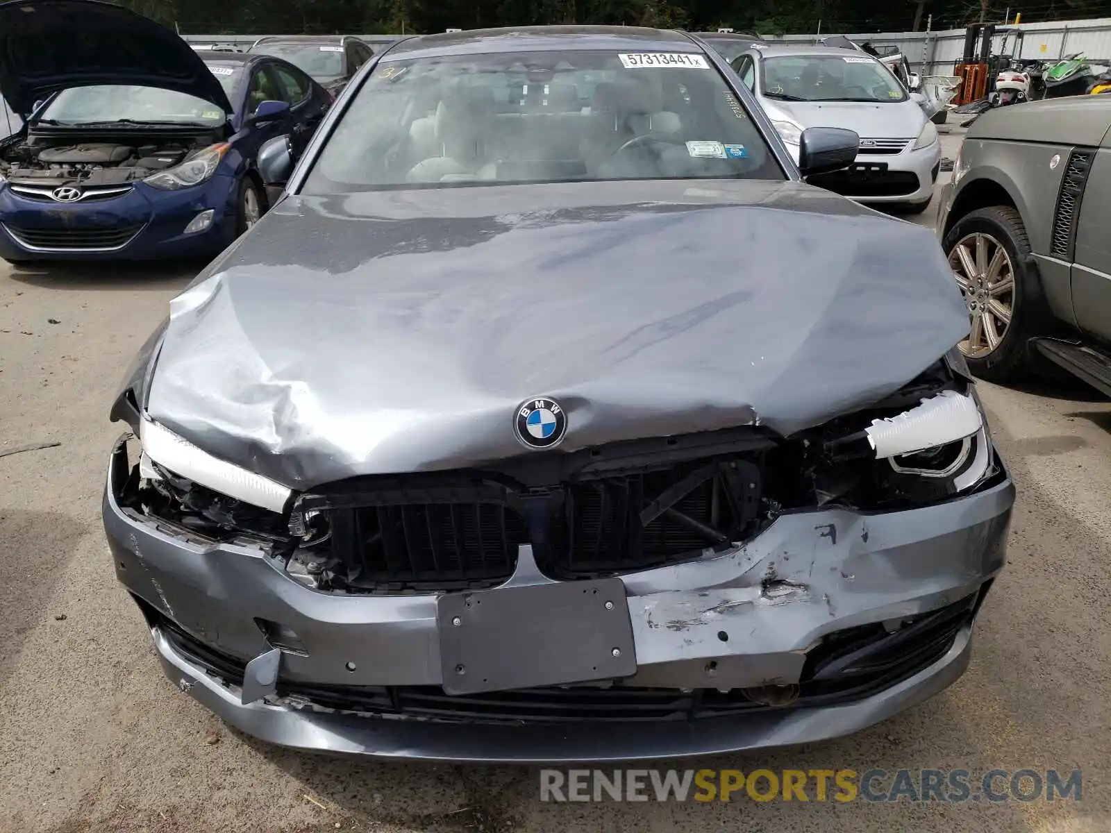 7 Photograph of a damaged car WBAJA5C52KBX87169 BMW 5 SERIES 2019