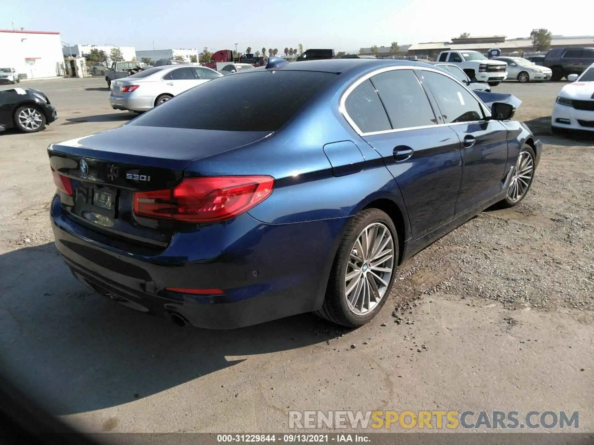 4 Photograph of a damaged car WBAJA5C52KBX87317 BMW 5 SERIES 2019