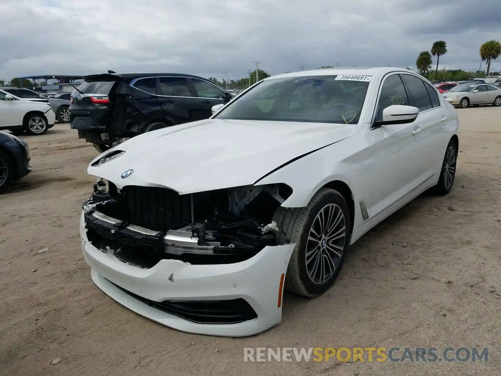 2 Photograph of a damaged car WBAJA5C56KWW09435 BMW 5 SERIES 2019