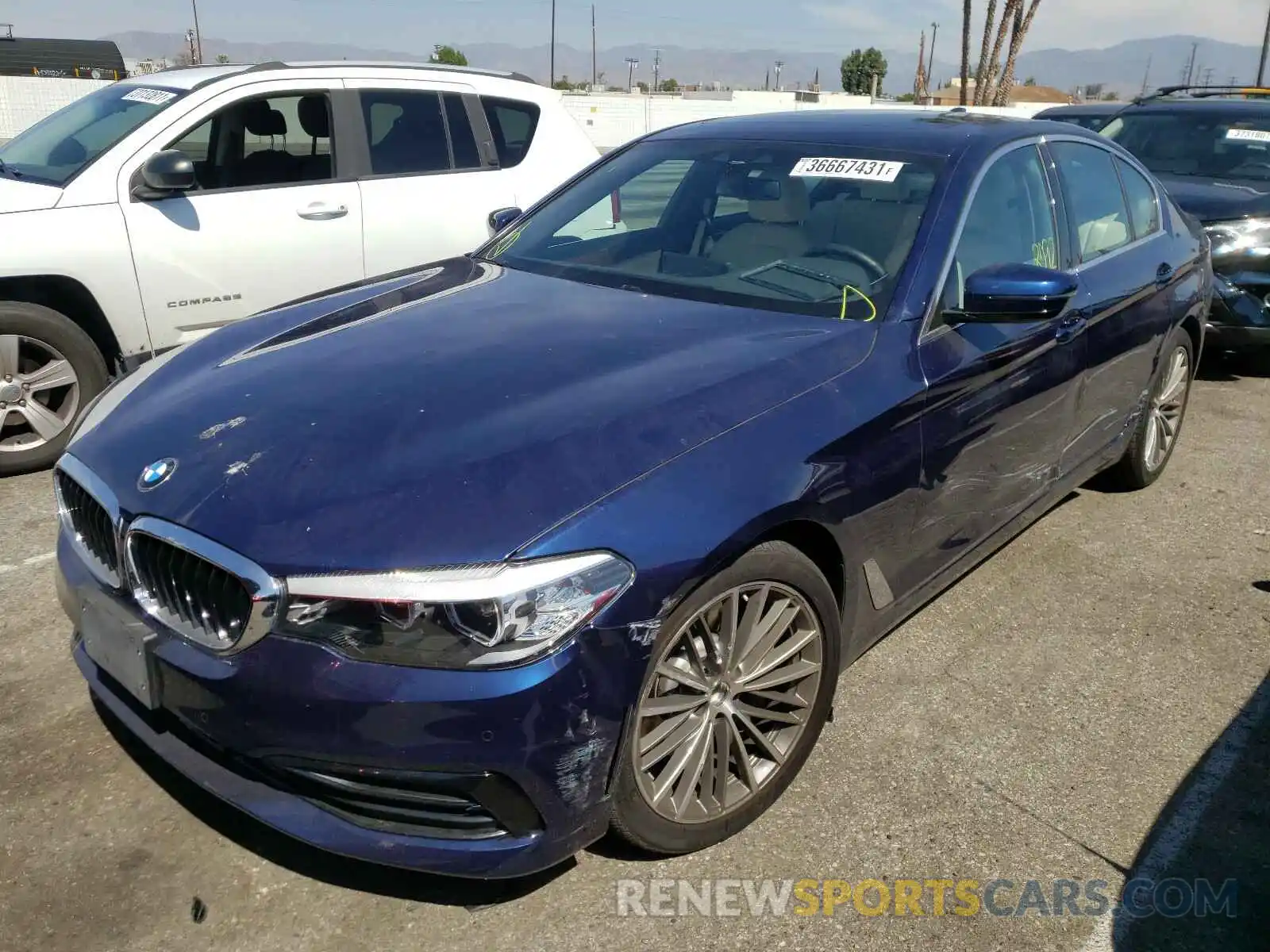 2 Photograph of a damaged car WBAJA5C5XKWW25976 BMW 5 SERIES 2019