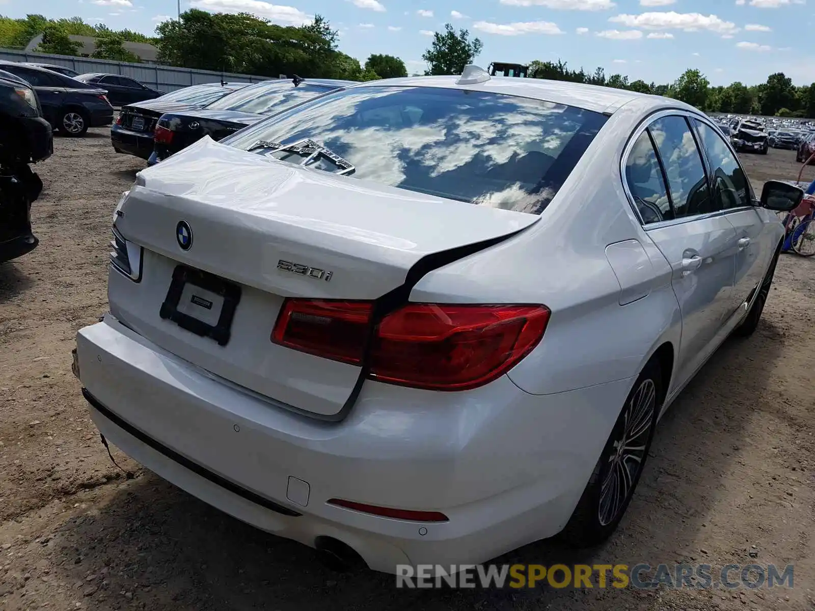 4 Photograph of a damaged car WBAJA7C51KWW11346 BMW 5 SERIES 2019