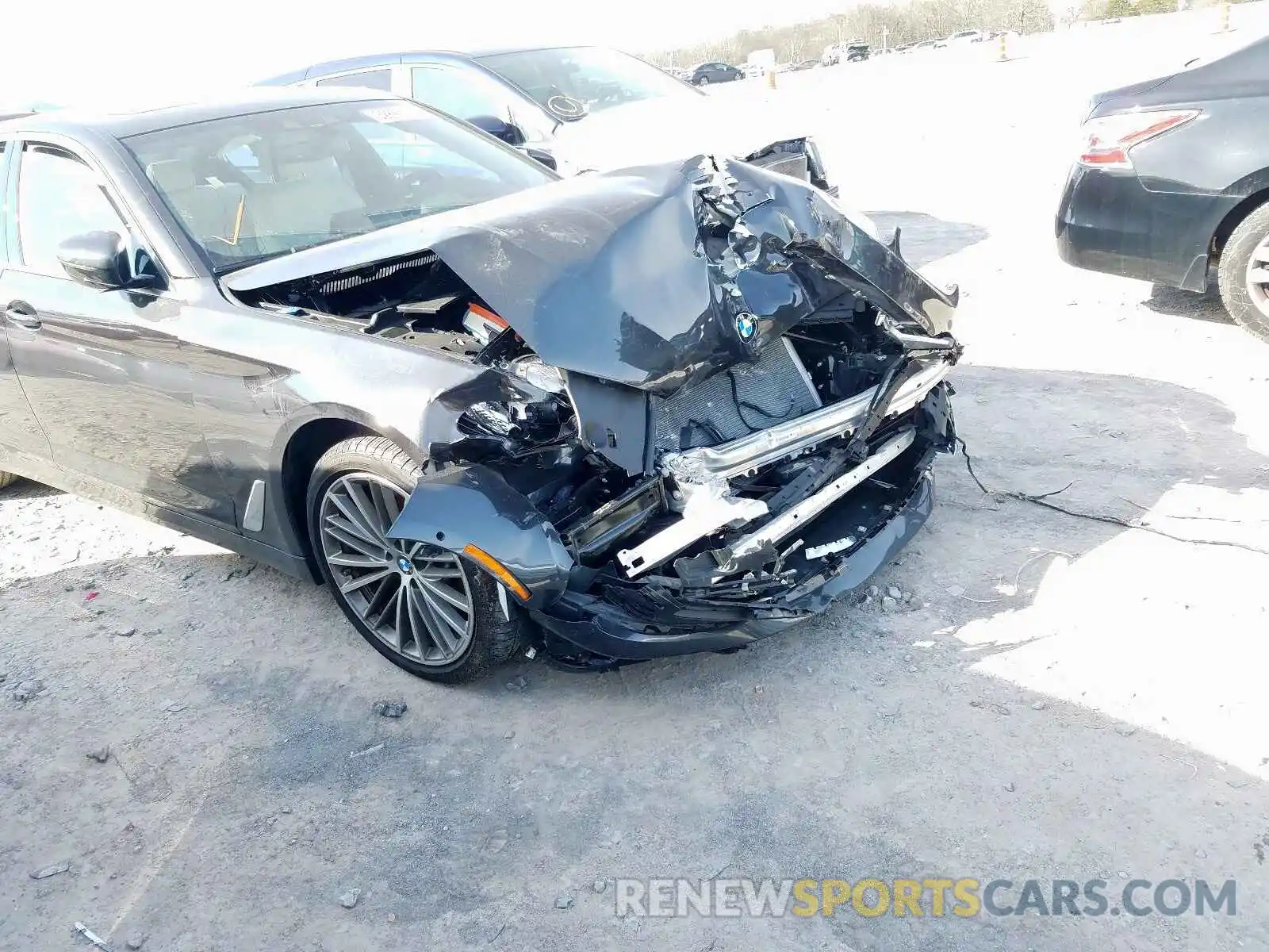 9 Фотография поврежденного автомобиля WBAJA7C56KWC77706 BMW 5 SERIES 2019