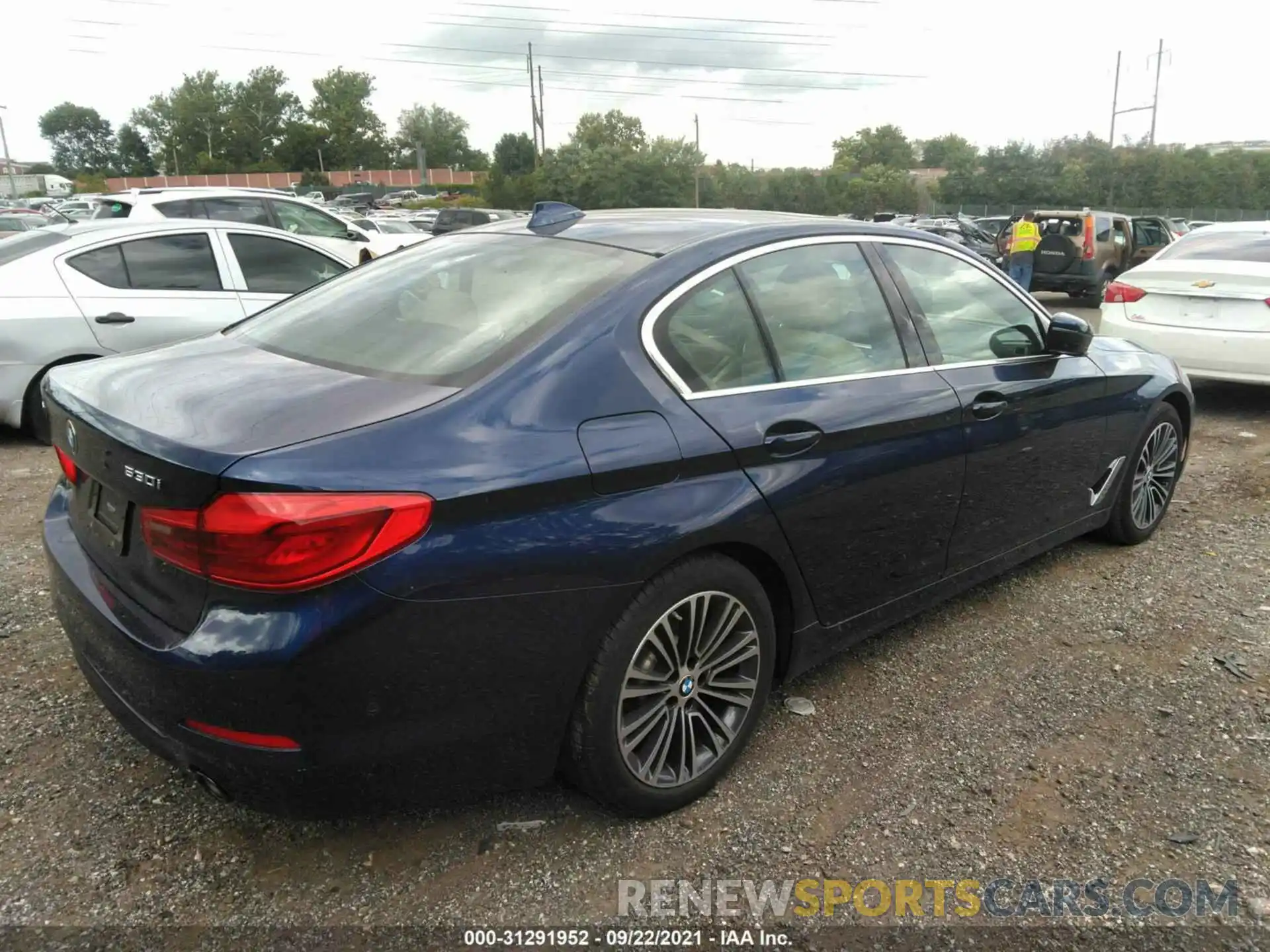 4 Photograph of a damaged car WBAJA7C5XKWW23138 BMW 5 SERIES 2019