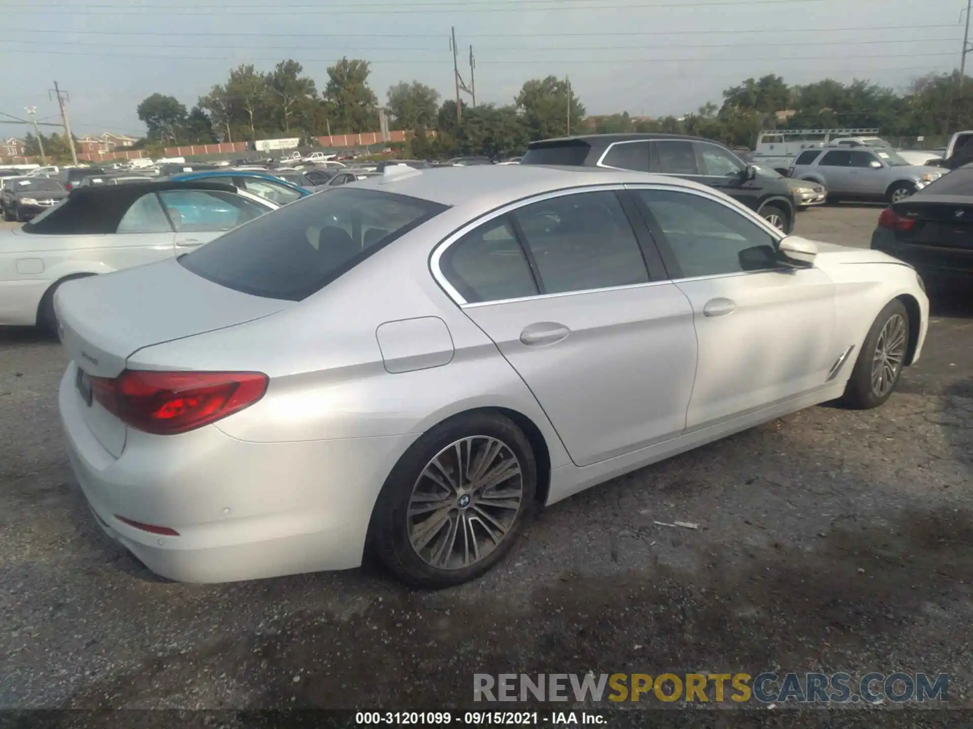 4 Photograph of a damaged car WBAJA7C5XKWW23446 BMW 5 SERIES 2019