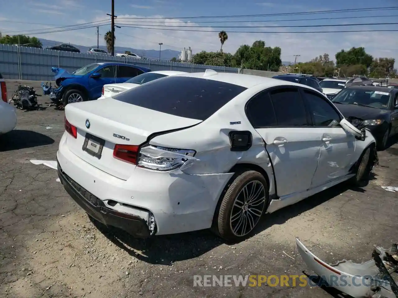 4 Photograph of a damaged car WBAJA9C50KB388154 BMW 5 SERIES 2019