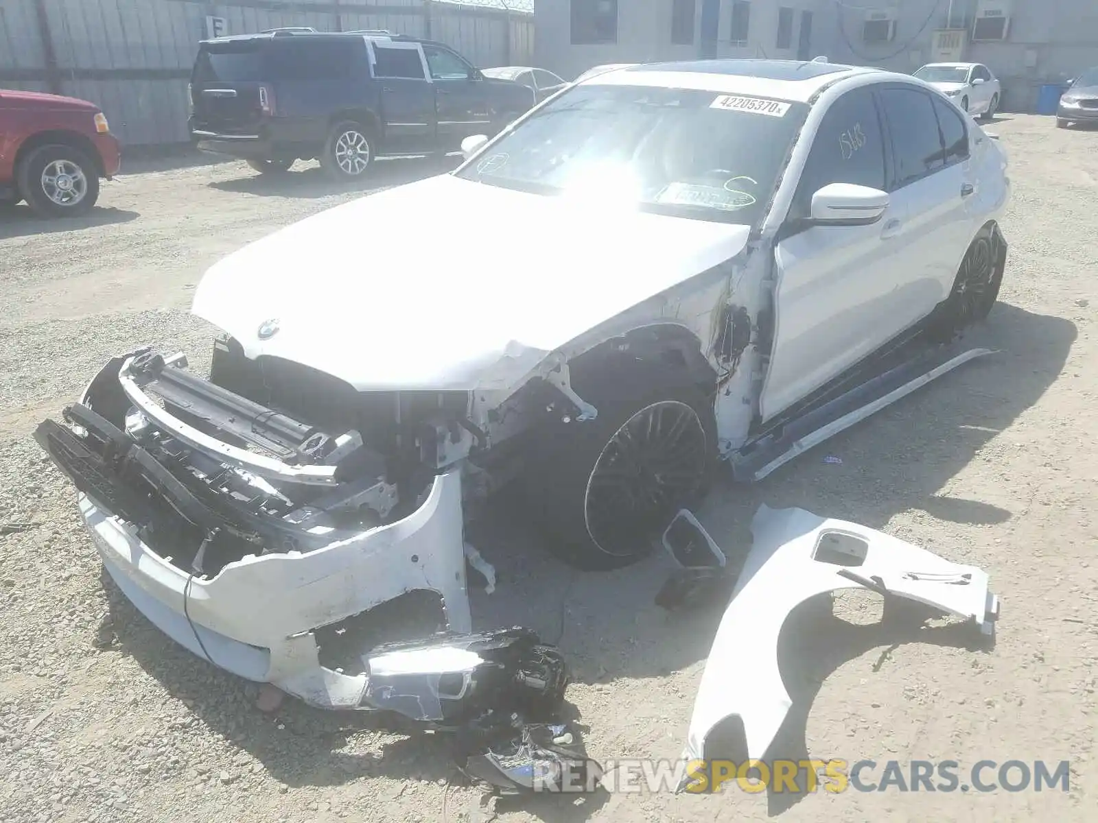 2 Photograph of a damaged car WBAJA9C54KB399352 BMW 5 SERIES 2019