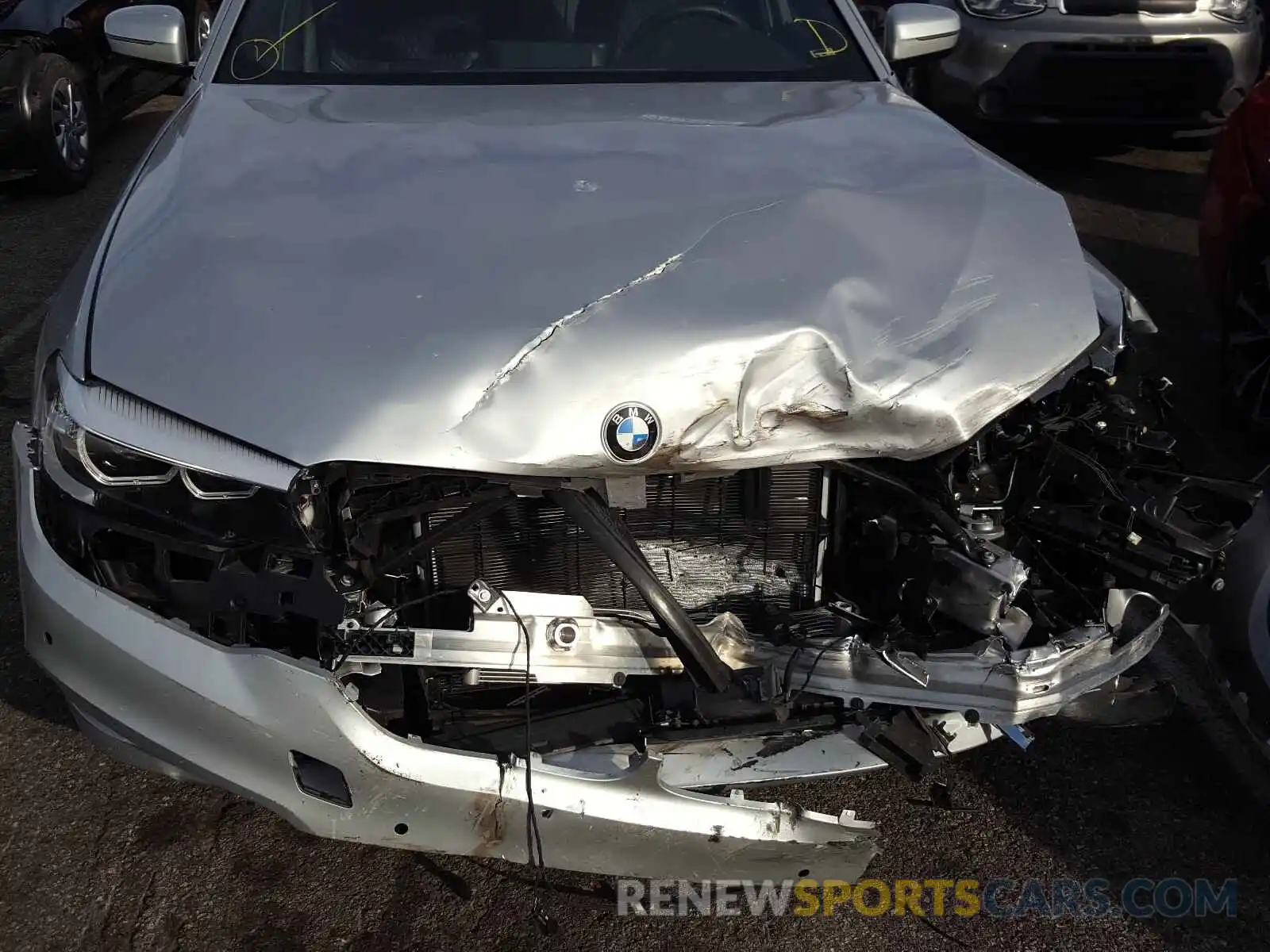 7 Photograph of a damaged car WBAJA9C57KB392749 BMW 5 SERIES 2019