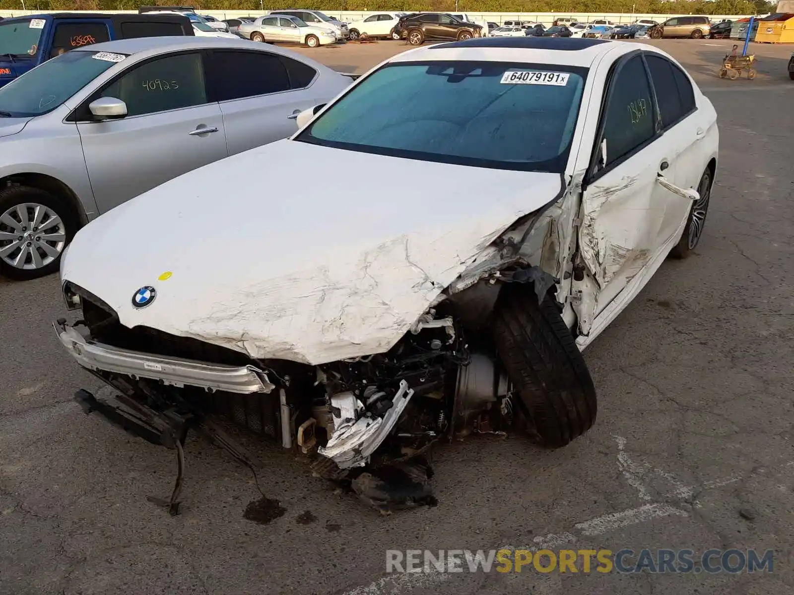 2 Photograph of a damaged car WBAJE5C51KWW05488 BMW 5 SERIES 2019