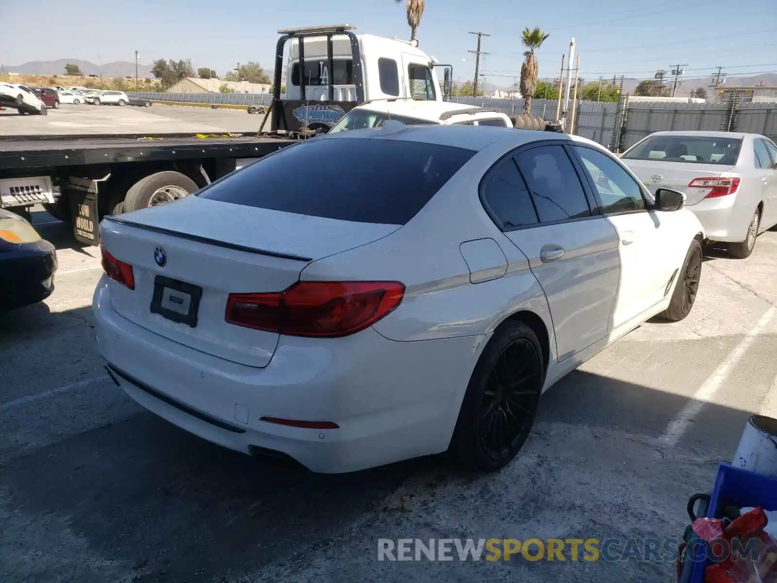 4 Photograph of a damaged car WBAJE5C52KG919872 BMW 5 SERIES 2019