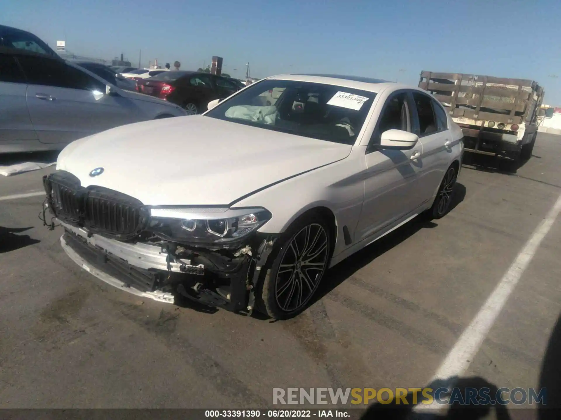 2 Photograph of a damaged car WBAJE5C52KWW03071 BMW 5 SERIES 2019