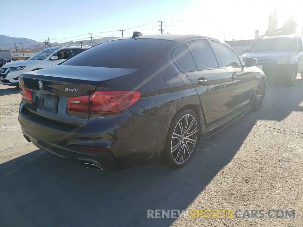 4 Photograph of a damaged car WBAJE5C54KG919095 BMW 5 SERIES 2019