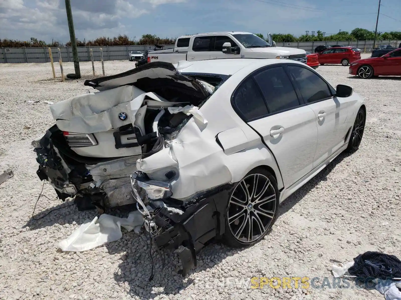 4 Photograph of a damaged car WBAJE5C57KWA98759 BMW 5 SERIES 2019